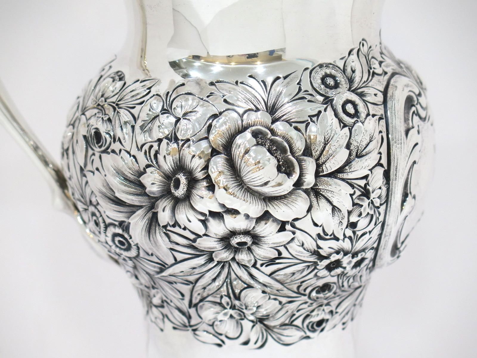 11 5/8 in - Sterling Silver Mauser Antique Floral Repousse Pitcher In Good Condition For Sale In Brooklyn, NY