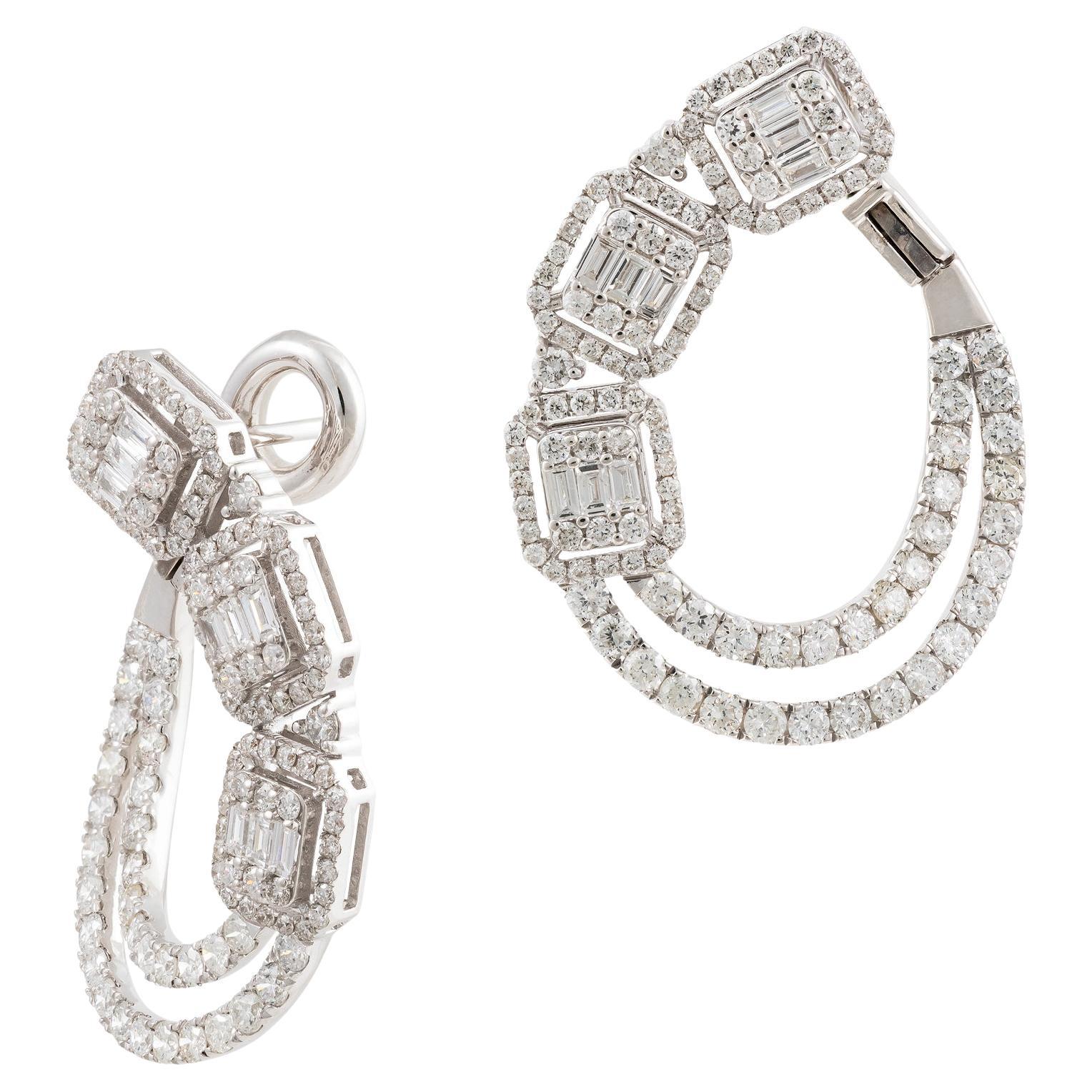 11, 500 Exquisite 18KT Gold Magnificent Triple Baguette Diamond Twist Earrings For Sale