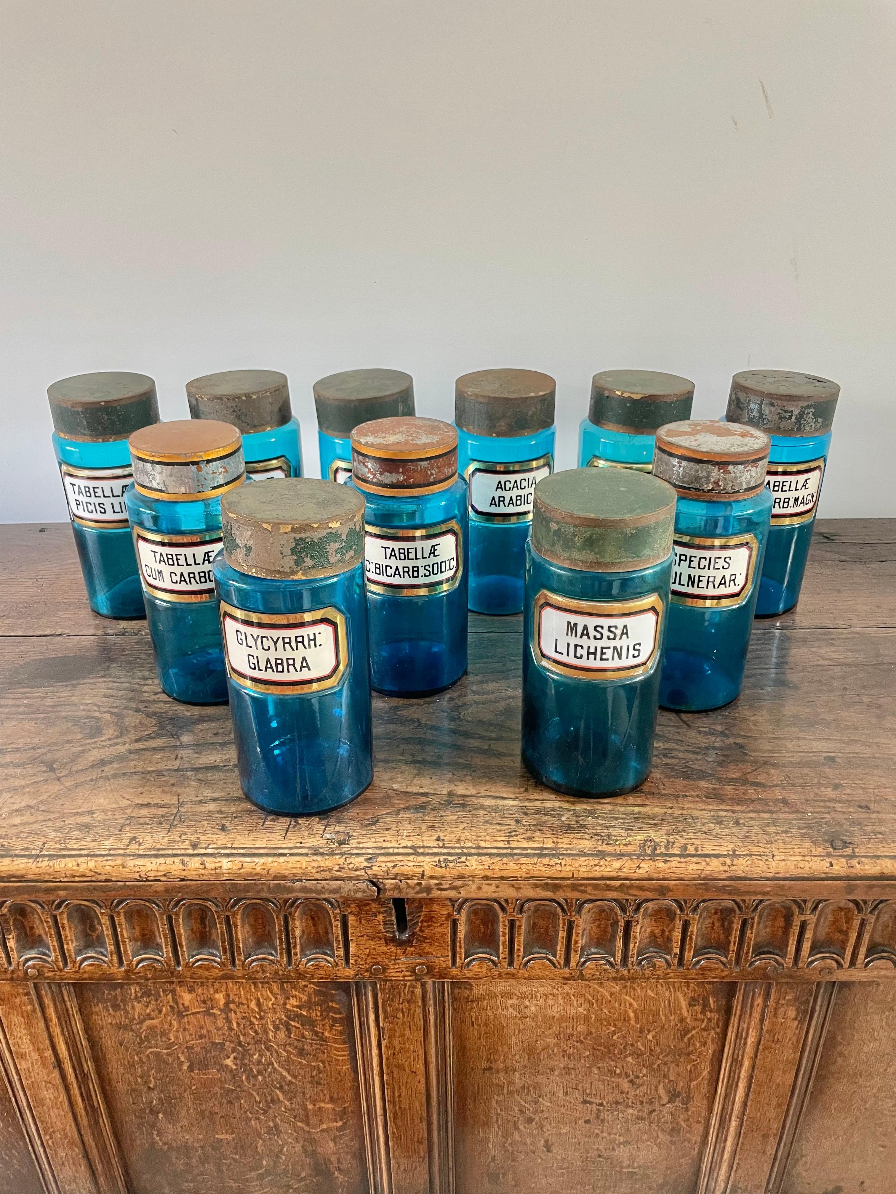 Good selection of antique blue glass apothecary bottles

French circa 1900 with original glass and enamel labels ,  Paris maker some have a paper label to the base 

Ground Pontil mark to the base  

Height 9.5 inches 

Diameter 4 inches 