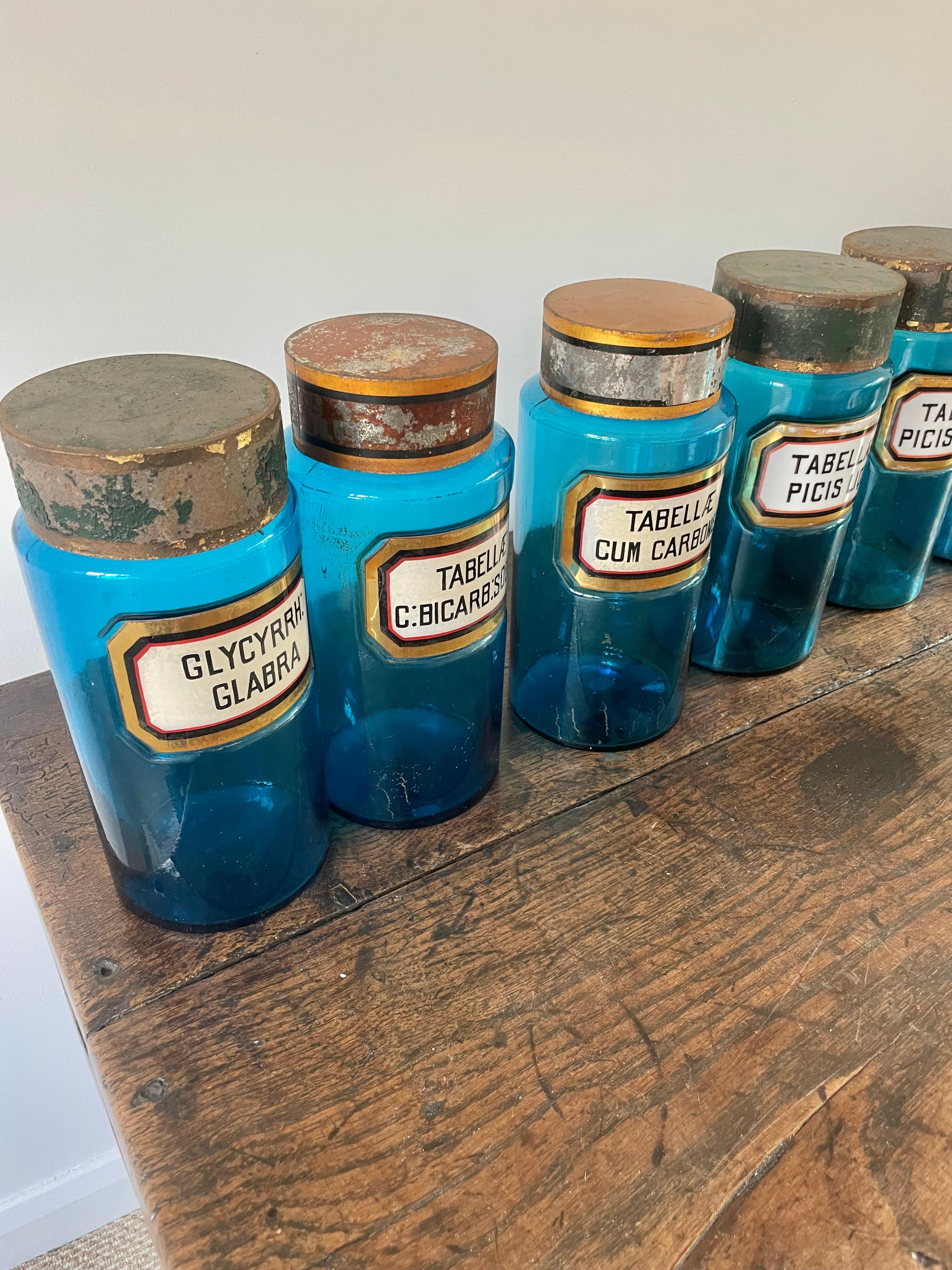 Glass 11 blue glass apothecary bottles