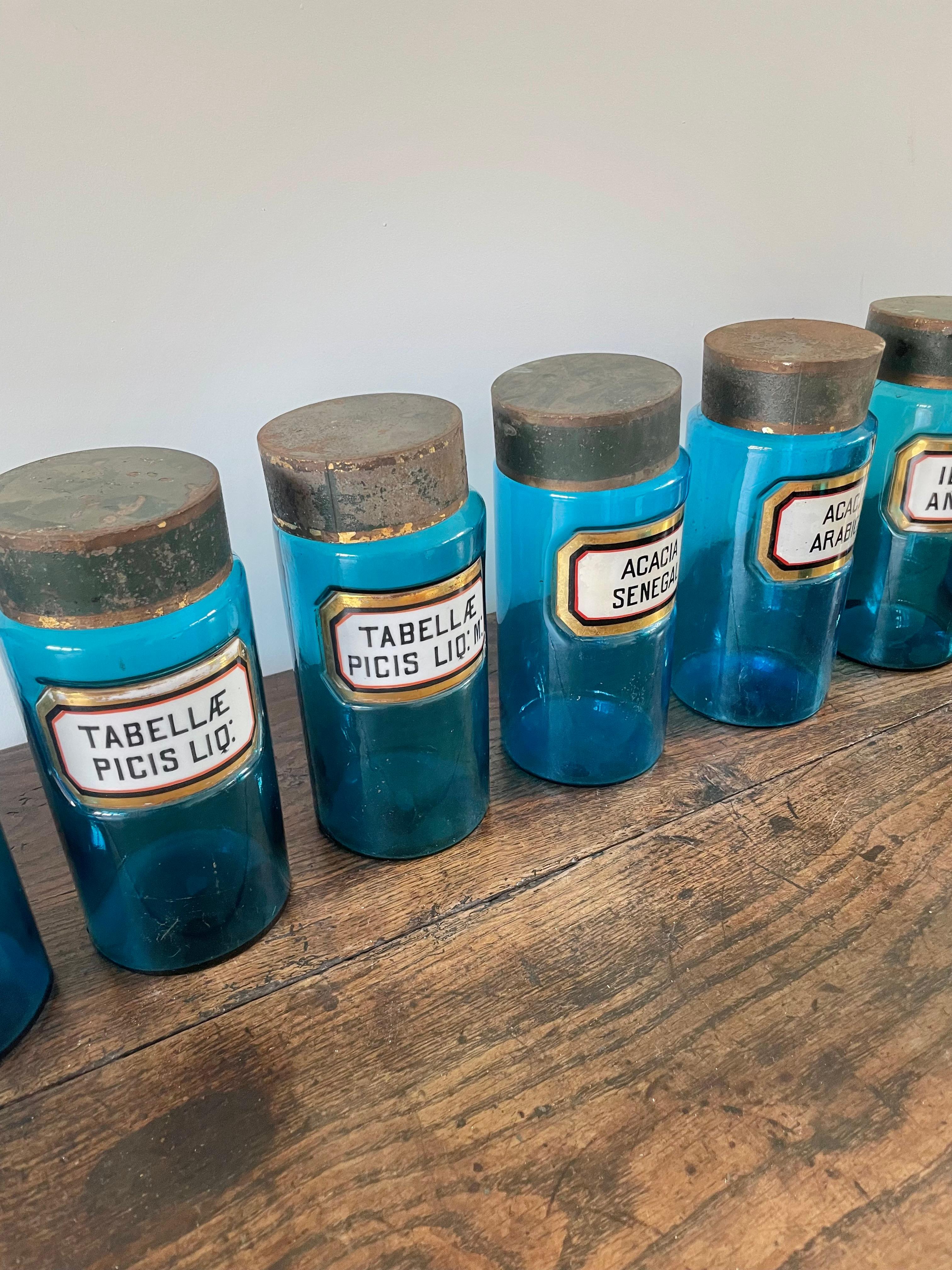 11 blue glass apothecary bottles 1