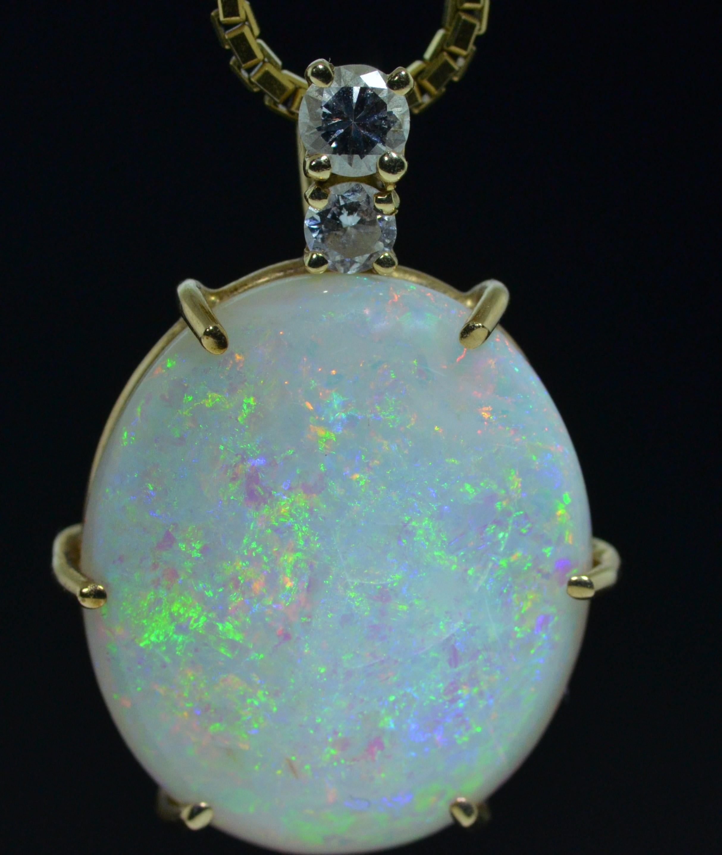 11 Carat Australian Opal Pendant in 14 Karat Yellow Gold Set with Diamonds In Excellent Condition For Sale In Warrington, PA