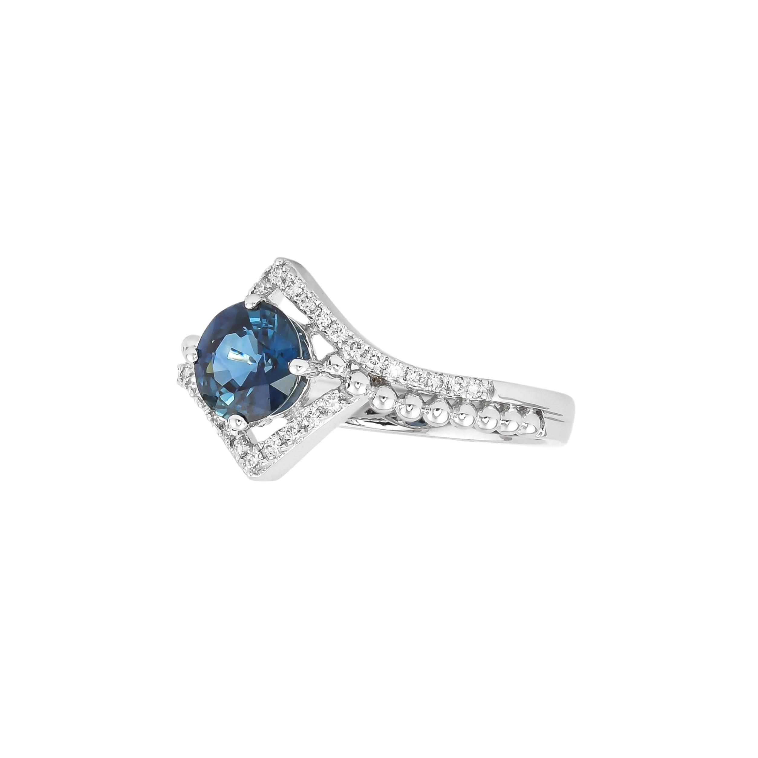 Contemporary 1.1 Carat Blue Sapphire and Diamond Ring in 18 Karat White Gold For Sale