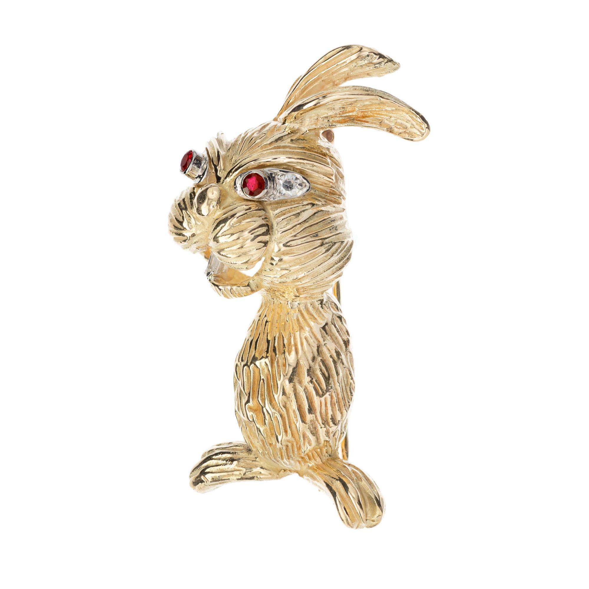 Vintage 1960's solid 18k yellow gold rabbit pin with with ruby eyes and diamond tooth and accents. Solid textured 18k yellow gold 

2 round red rubies, approx. .8cts
2 round single cut diamonds, G VS .6cts
1 step cut baguette, G VS approx. .5cts
18k