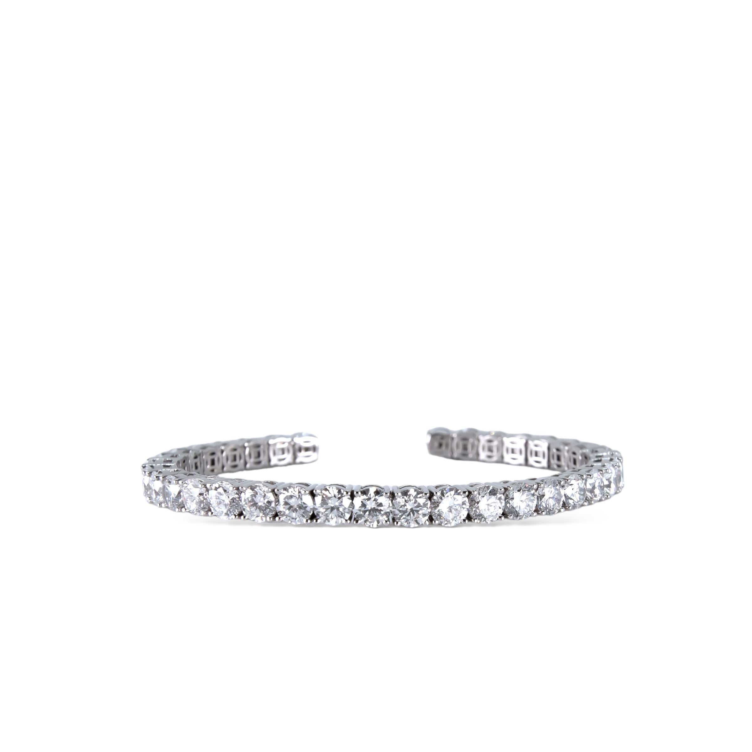 Over 11 carat diamond tennis bracelet flexible bangle, set with hand selected natural EF colour and VS clarity diamonds in your choice of 18k gold or platinum. 

All of our diamonds are hand selected and perfectly matched, and are of high quality