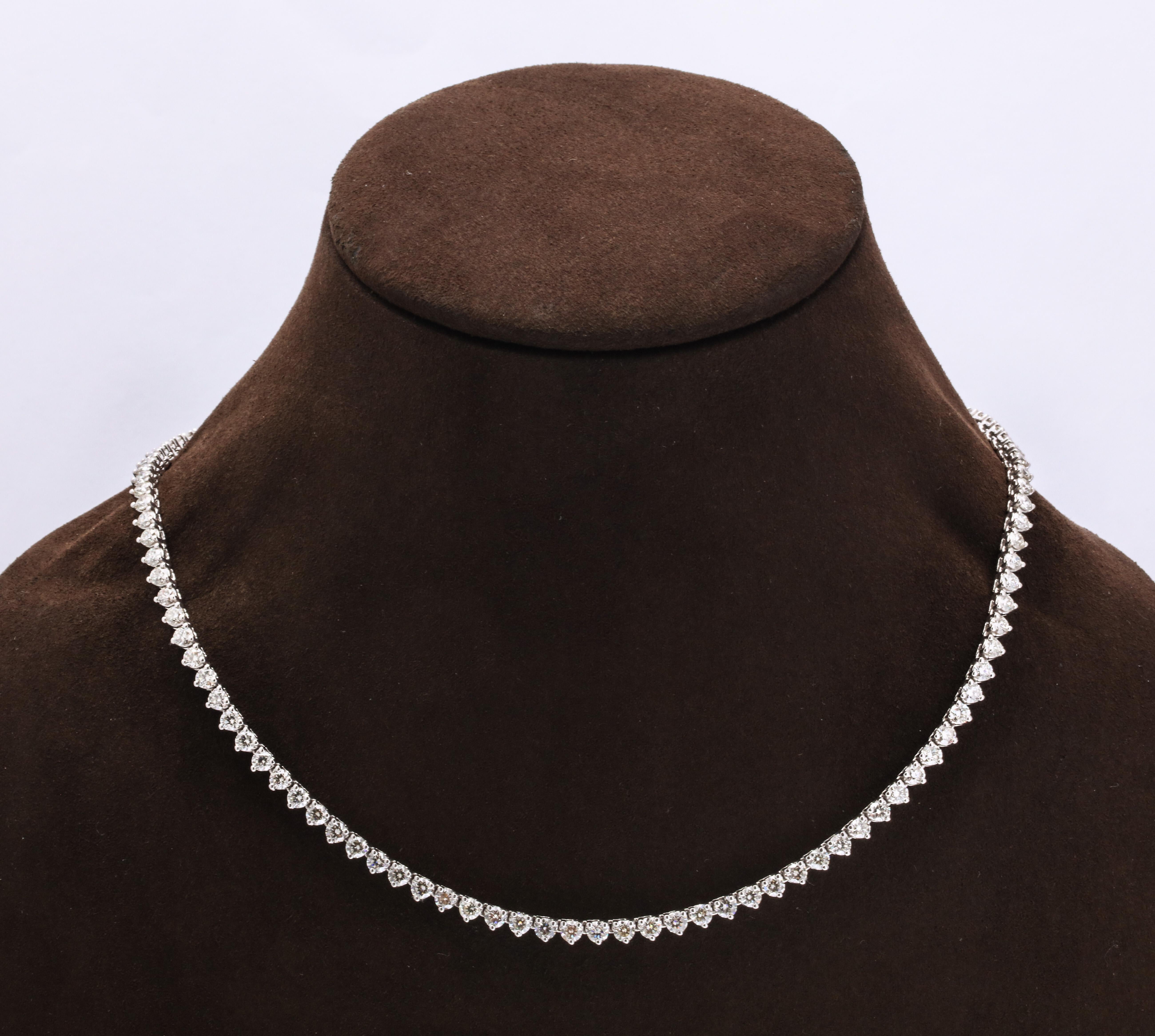 
The perfect tennis necklace!

11.12 carats of white round brilliant cut diamonds set in white gold. 

16 inch length that can easily be adjusted. 

The ideal diamond size, this necklace can be dressed up or down. 