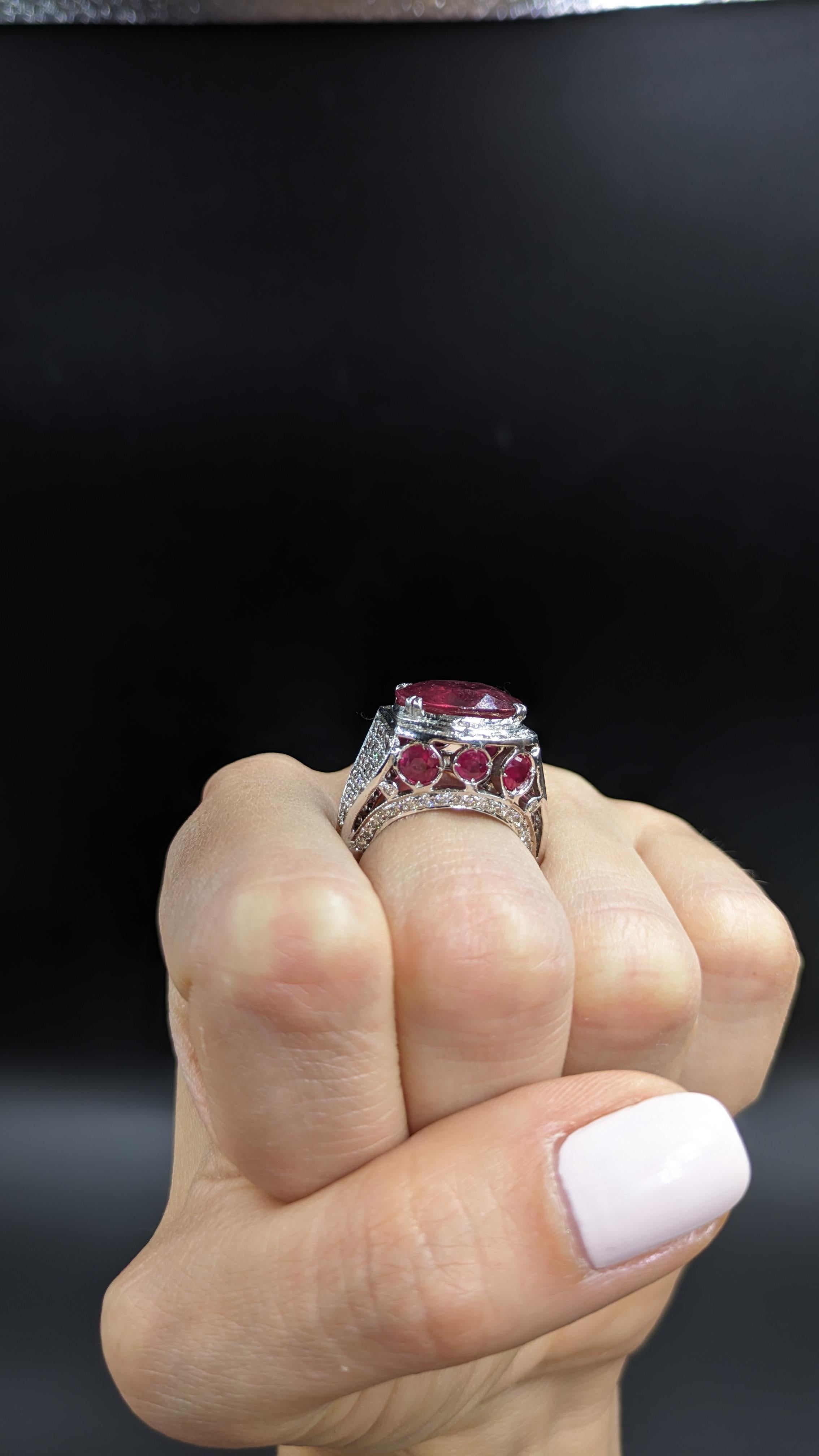 Oval Cut 11 Carat Natural Ruby Ring and 2.3 carat Diamond Cocktail Ring For Sale