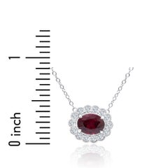 1.1 Carat Oval Ruby Pendant with 0.24 Carat Natural Diamond Halo in 14k ref1183