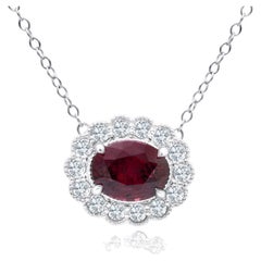 1.1 Carat Oval Ruby Pendant with 0.24 Carat Natural Diamond Halo in 14k ref1183