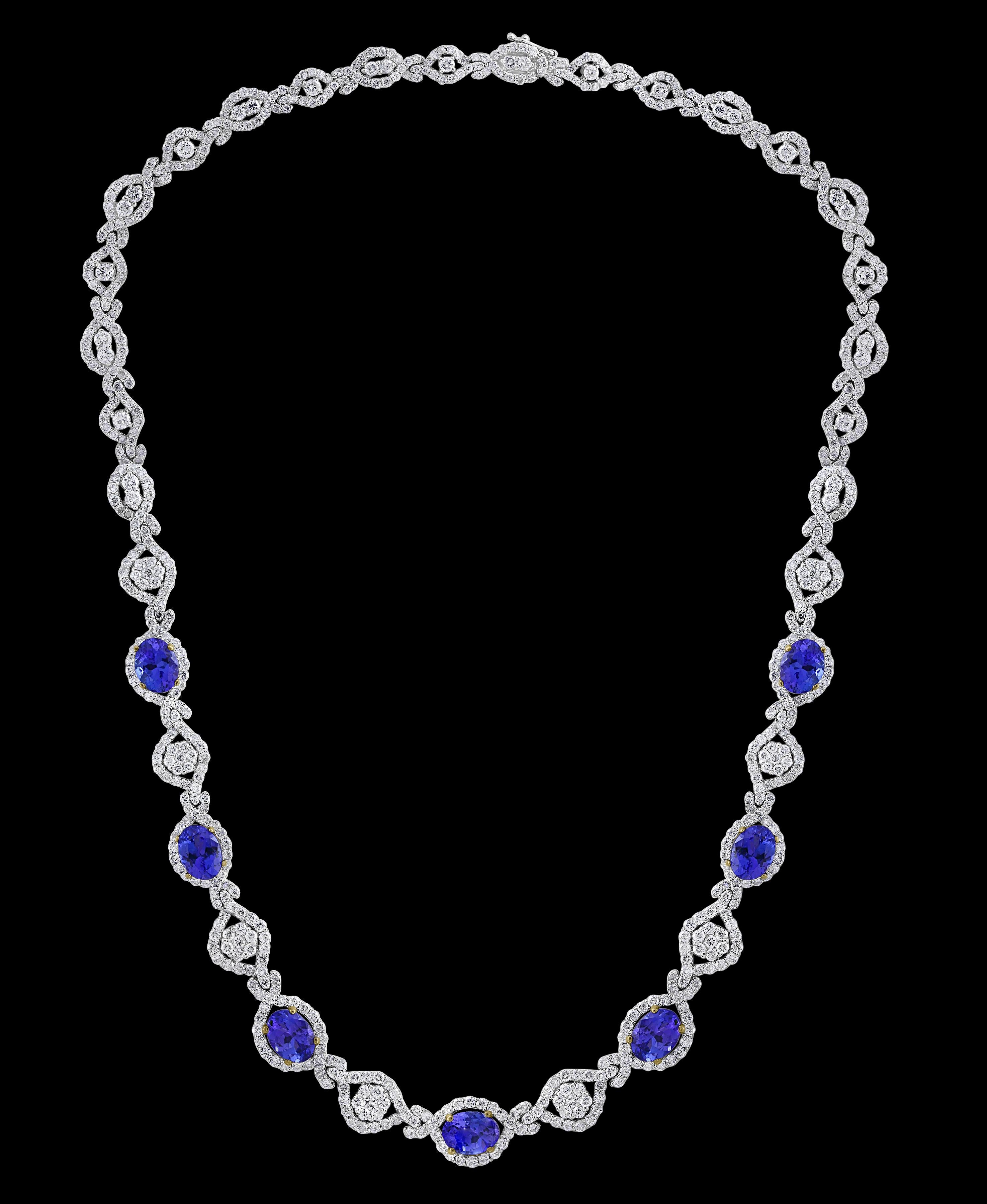 This extraordinary Necklace is consist of 7 Fine oval Tanzanite  weighing approximately 11 Carats. There are  total  of  approximately 13 carats of shimmering white diamonds, 
The clear, intense hue of this tanzanite is the most coveted of all these