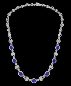 11 Carat Oval Tanzanite and 12 Carat Diamonds Necklace 18 Karat Gold Estate