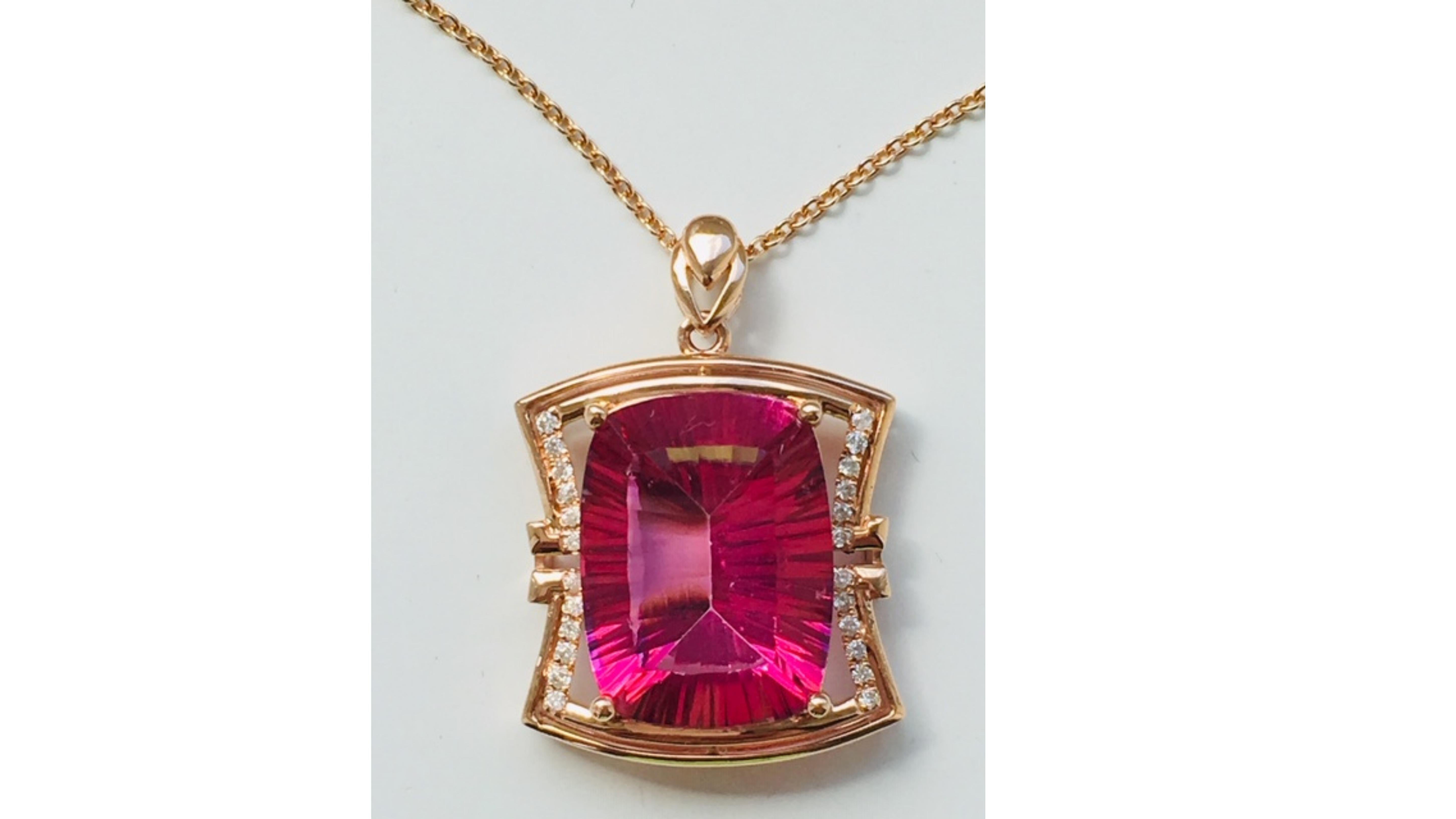 This 11ct Pink Topaz stand out with 20 white diamonds set in 18k rose gold.  This can also be made to suite too so can be  a higher ct and in white or yellow gold with other stones etc.



Pink Topaz is a pink gemstone that comes from a sole deposit