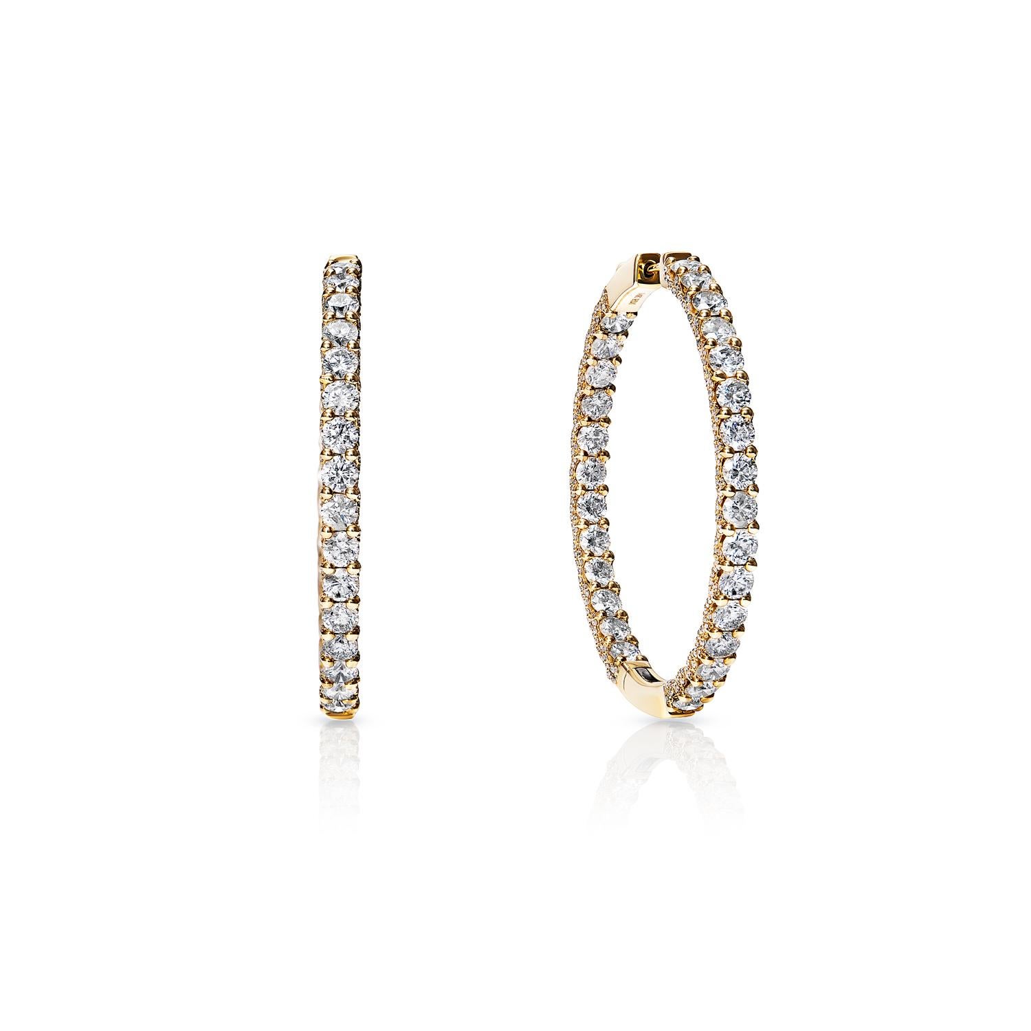 Diamond Hoop Earrings For Ladies:

Carat Weight: 11.10 Carats
Style: Round Brilliant Cut
Metal: 14 Karat Yellow Gold
Style: Hoop Earrings