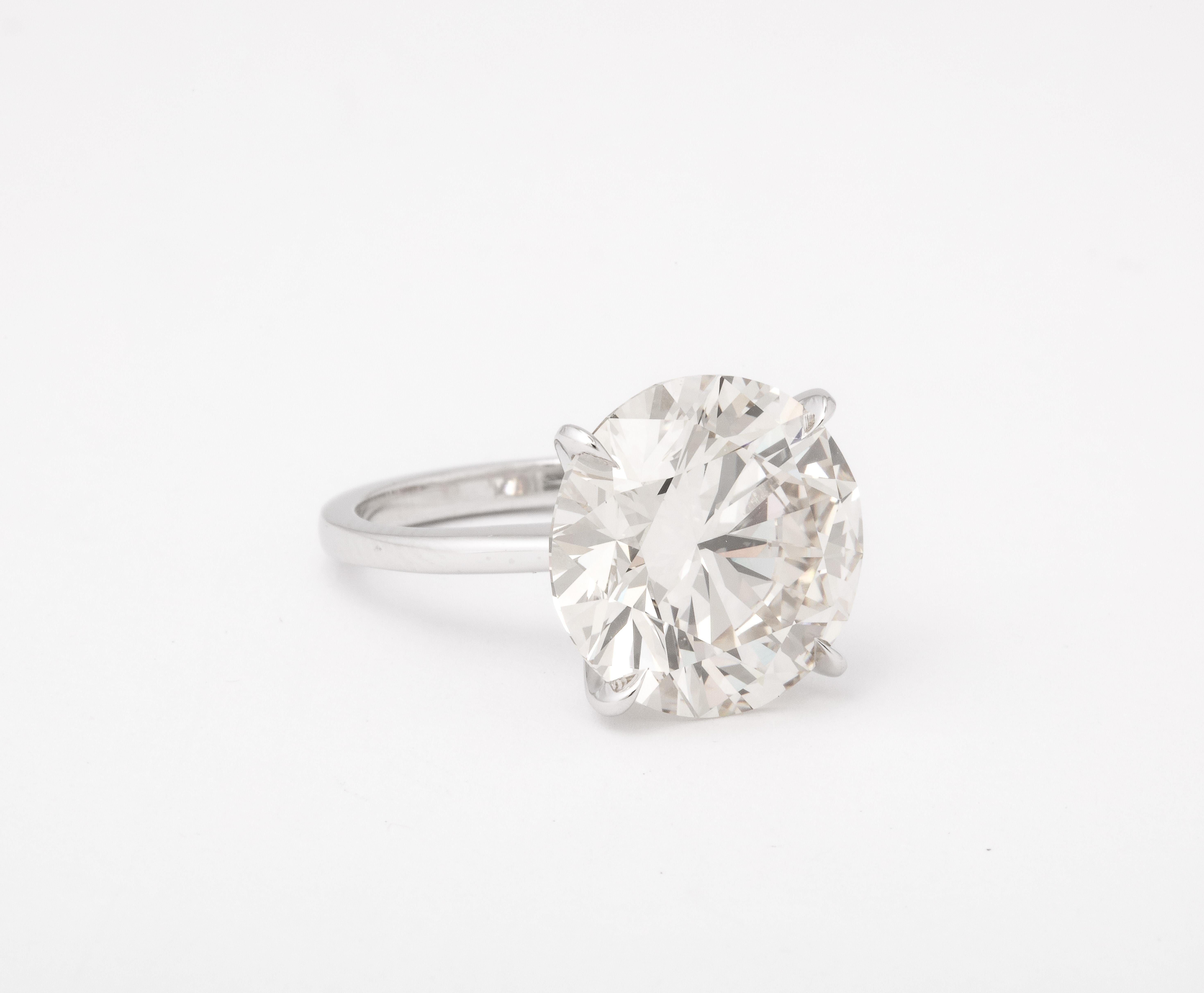 11 carat diamond ring on finger