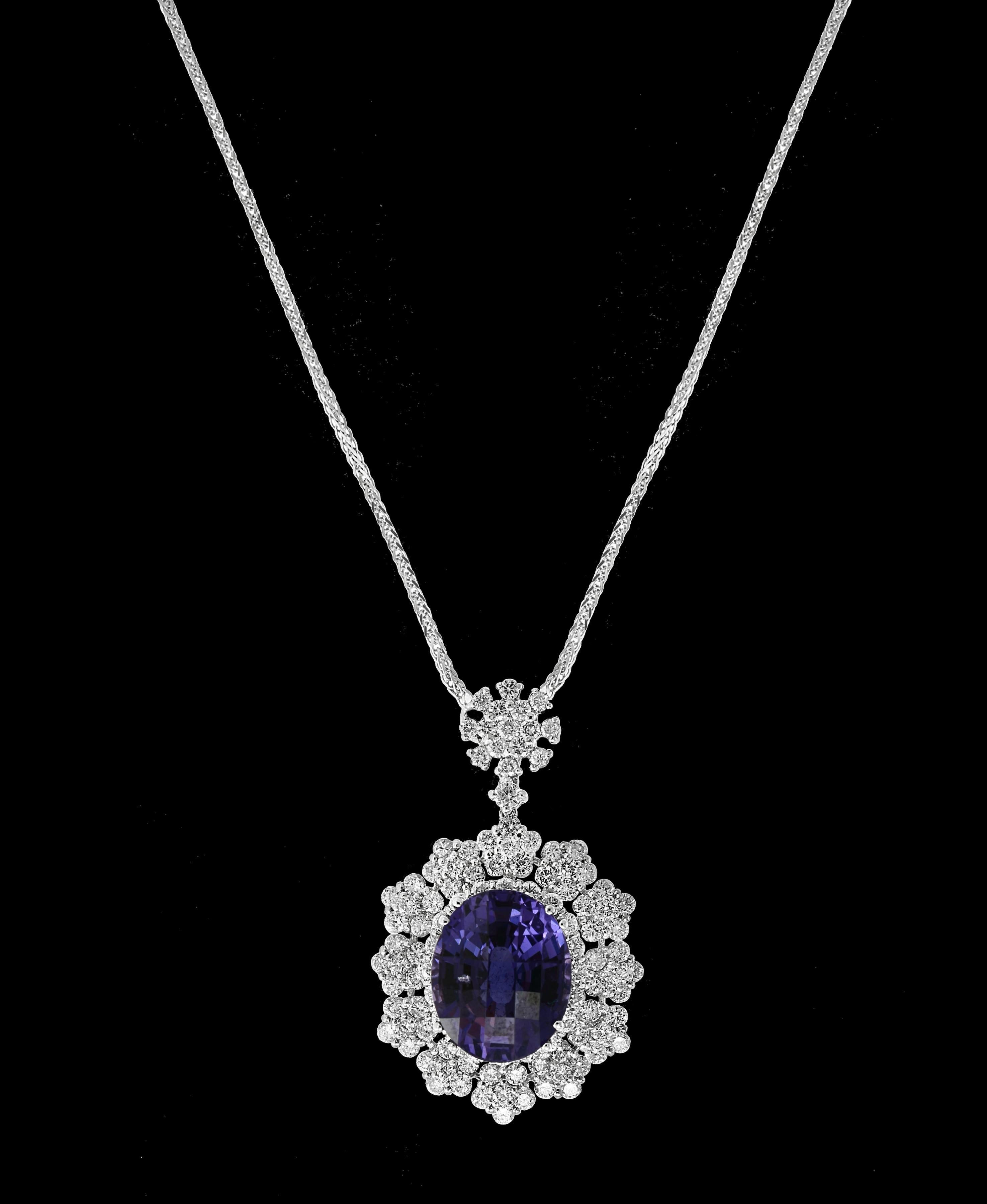   11 Carat  Round  Shape Spinel  & Diamond Pendant Necklace 18 K Gold
This spectacular Pendant Necklace  consisting of a single Round Shape Spinel approximately  11 Carat.  The  Spinel    is surrounded by approximately  4.2 Carats of  brilliant cut