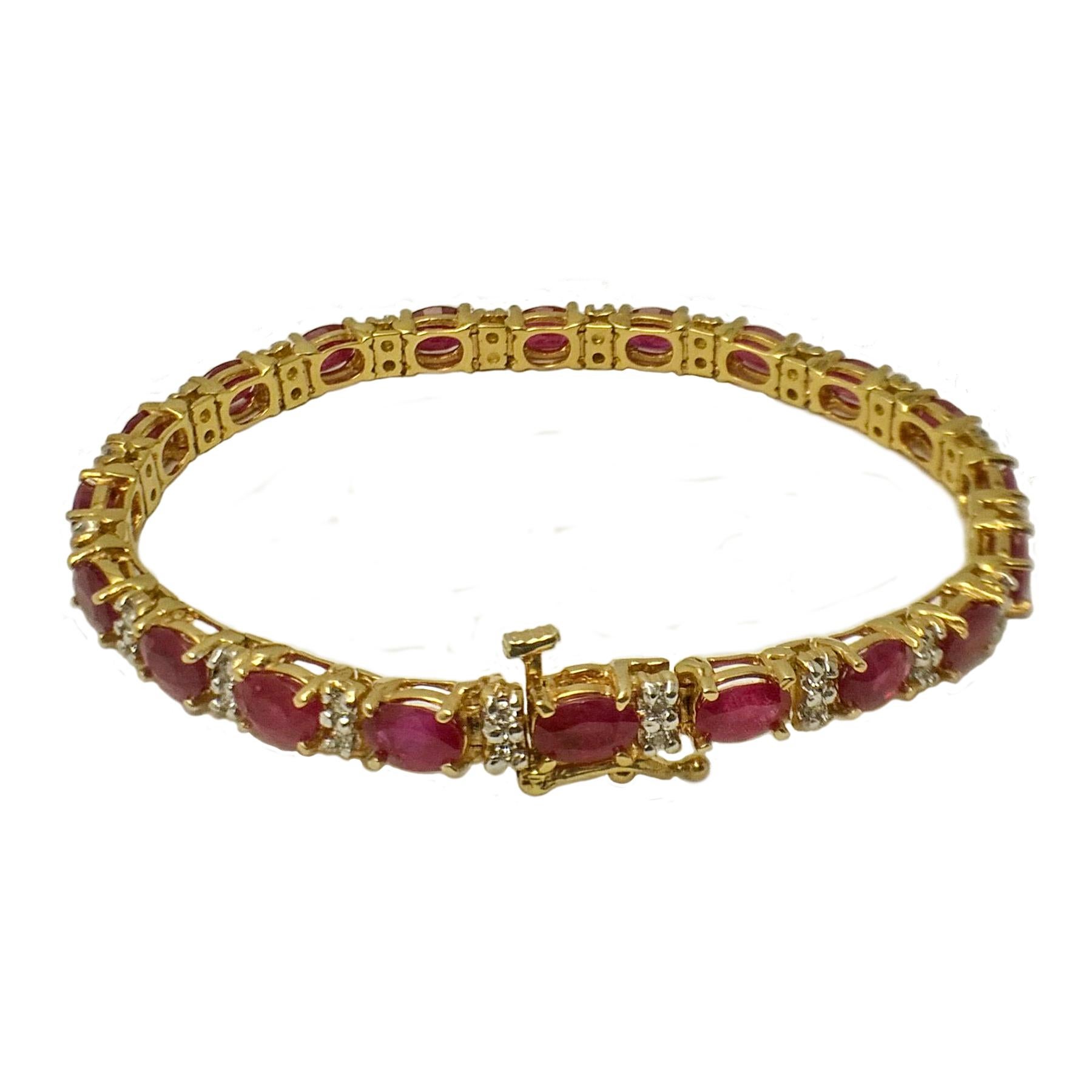 Elegant ruby and diamond bracelet in yellow gold. Lively red, luster, oval faceted, rubies linked with round brilliant cut diamonds. Beautiful, flexible design set in 14 karat yellow gold, with hinged clasp and safety catch. 

Ruby: 11 carats,