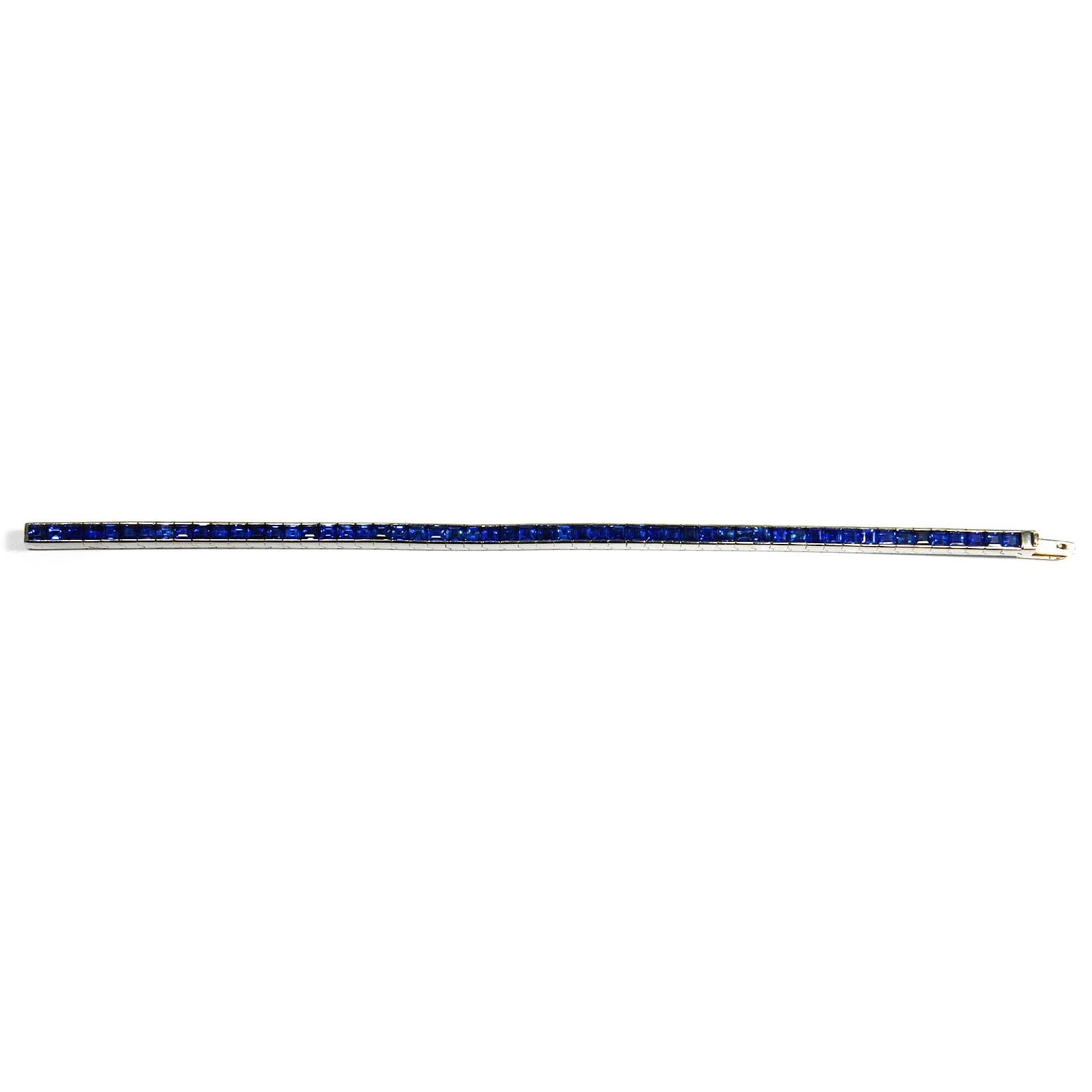11 ct Natural Blue Sapphire Tennis Line Bracelet in 18K White Gold

Luxurious, flexible line bracelet with 55 natural, cornflower blue sapphires, totaling approx. 11 ct in a white golden channel setting, secured with concealed insert clasp.

750