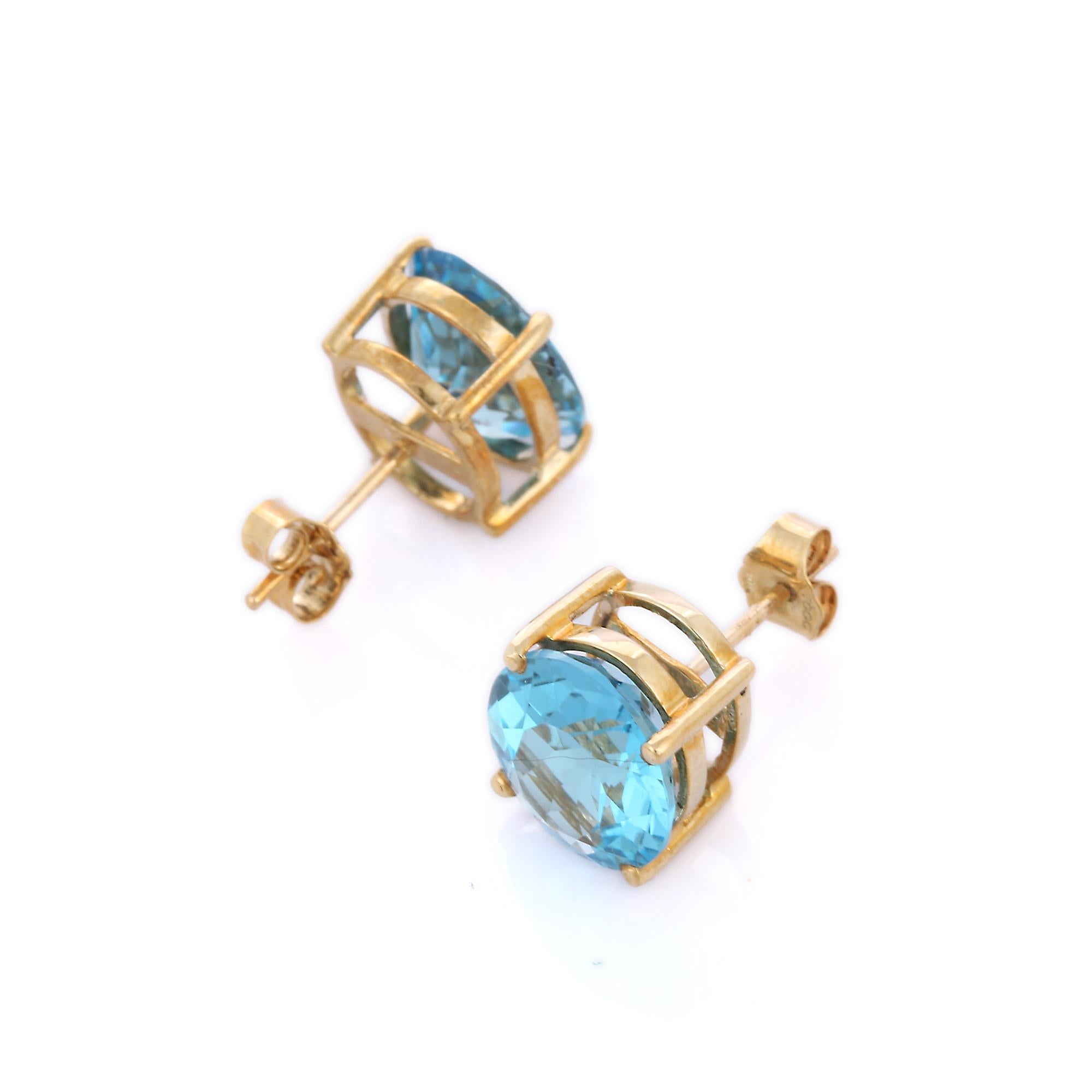 Modern 11 Ct Oval Cut Prong Set Blue Topaz Stud Earrings in 10K Yellow Gold  For Sale