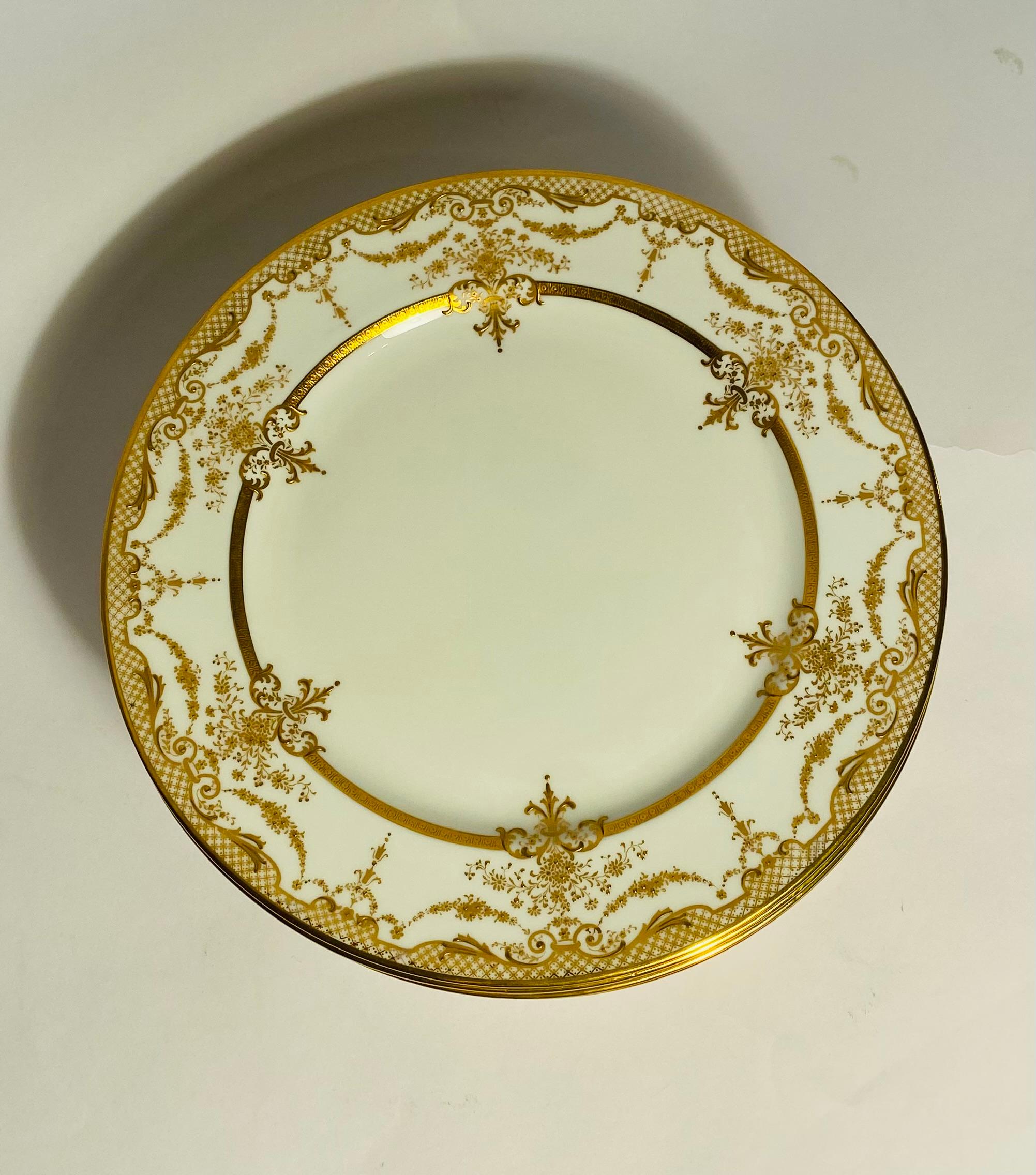 11 Platos antiguos dorados en relieve para Shreve & Co Circa 1915 Hecho a mano en venta