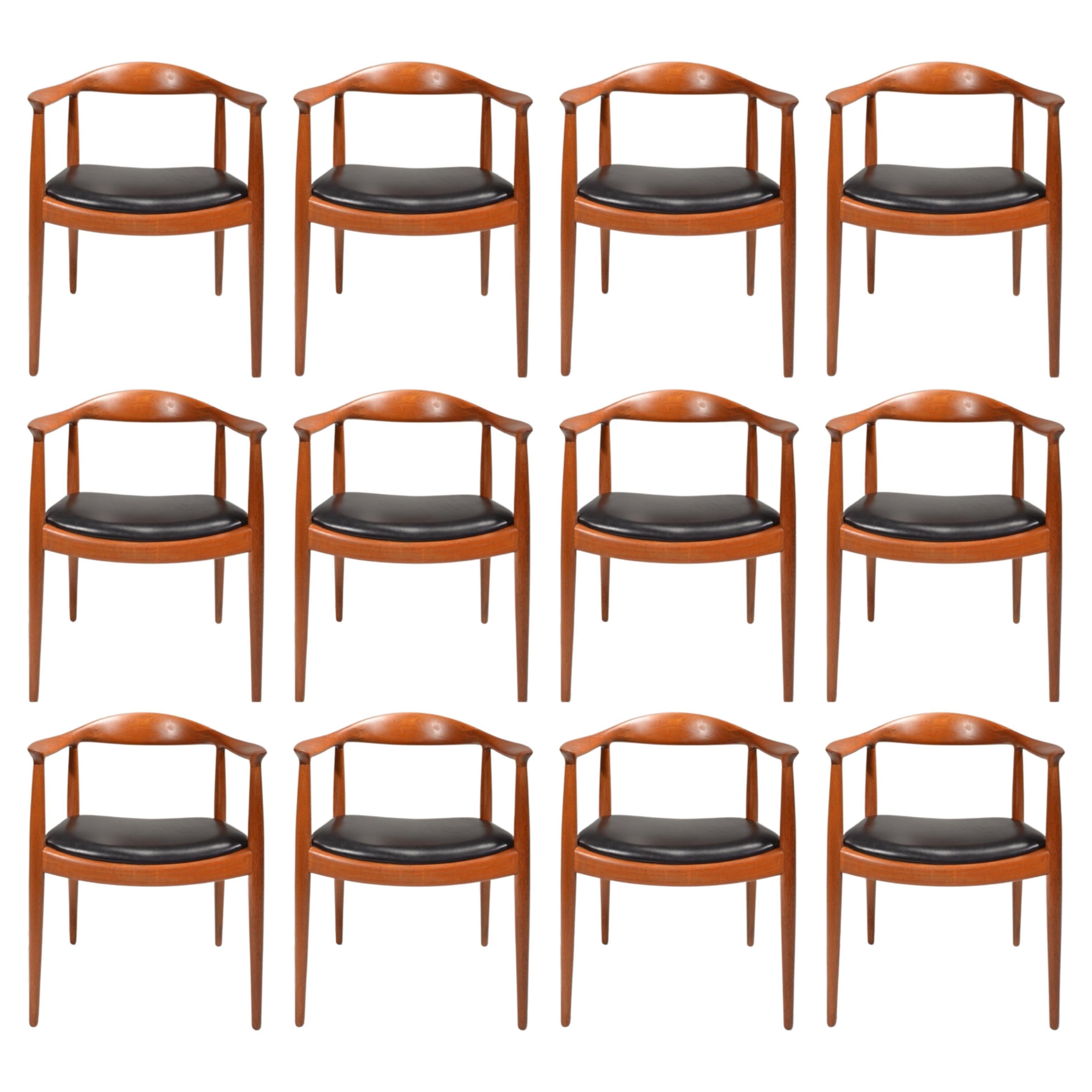 We are excited to offer 11 early Hans Wegner JH-503 chairs designed in 1949 and Produced by Johannes Hansen. Fully restored solid old growth teak construction. Stamped with the maker's mark. Currently we have 4 in black leather and one in white