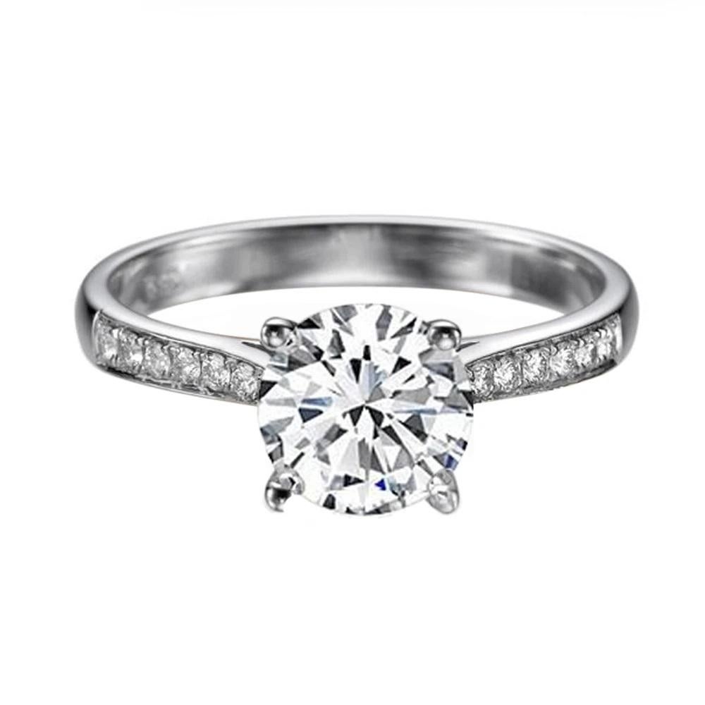 Dazzling solitaire with accents channel set cathedral diamond engagement ring. Center stone is of 1 carat natural, round shape, F-G color, VS2-SI1 clarity GIA certified diamond and it is surrounded with 12 natural, round diamonds. Set in slick 14K