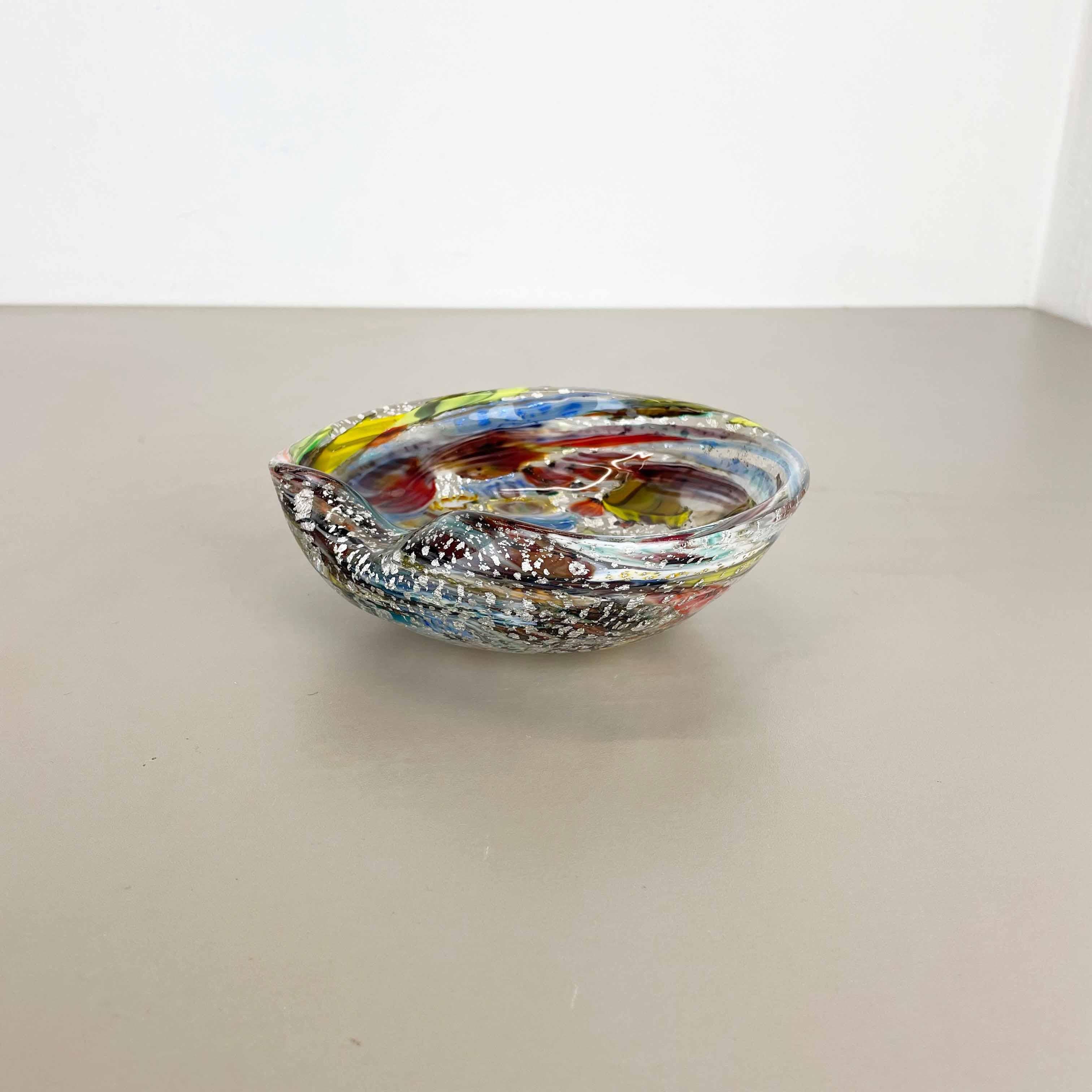 Article:

Murano glass bowl, ashtray element, Silver FLAKES.

DINO MARTENS FOR AURELIANO TOSO, 1960s


Origin:

Murano, Italy


Decade:

1960s


This original glass shell bowl was produced in the 1960s in Murano, Italy. An elegant