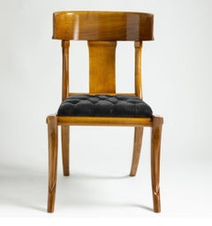 11 klismos chairs and 2 klismos armchairs