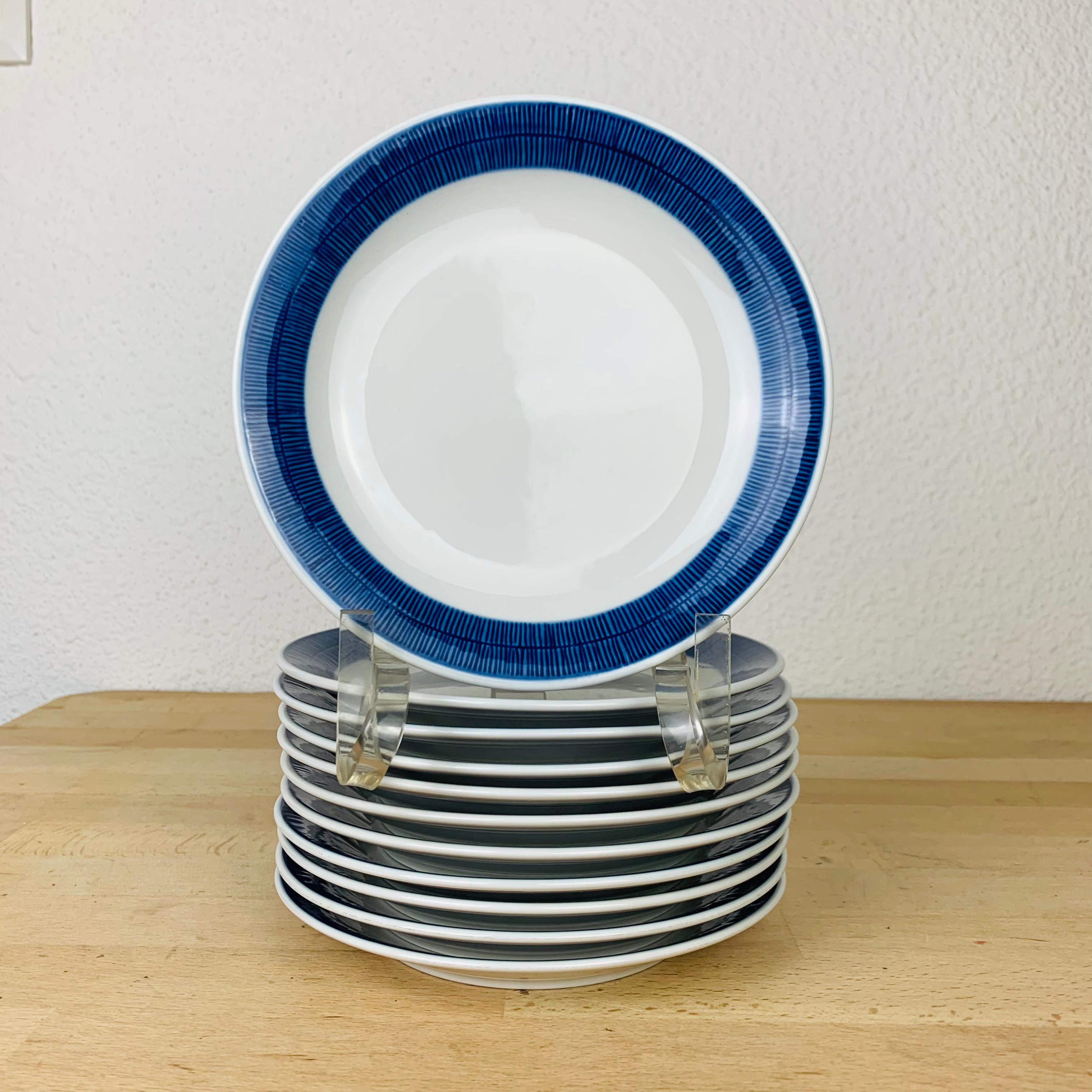 Set of eleven Koka dessert/cake plates by Hertha Bengtson for Rörstrand Sweden, manufactured in the 1960's. 

Slight wear due to its age and use, no chip, no crack. 

Measurements : diameter 17 cm, height  cm