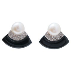 Pendientes de perlas de 11 mm, ágata negra, diamantes y platino.