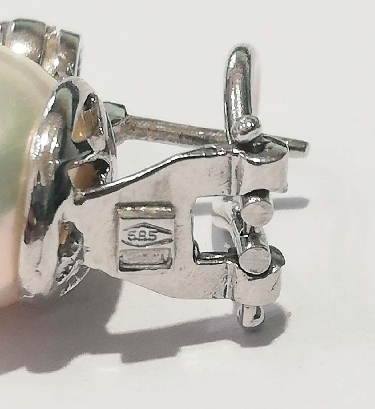 Women's 11 Mm Pearls, Diamonds, 14 Karat White Gold Earrings.