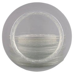 11 René Lalique Phalsbourg plates in clear art glass with vines and grapes.