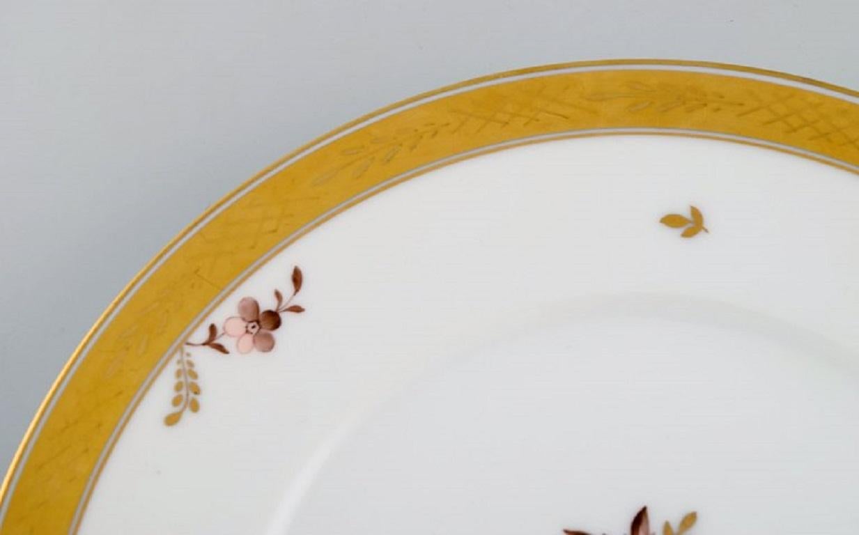 Hand-Painted 11 Royal Copenhagen Golden Basket Porcelain Dinner Plates with Flowers