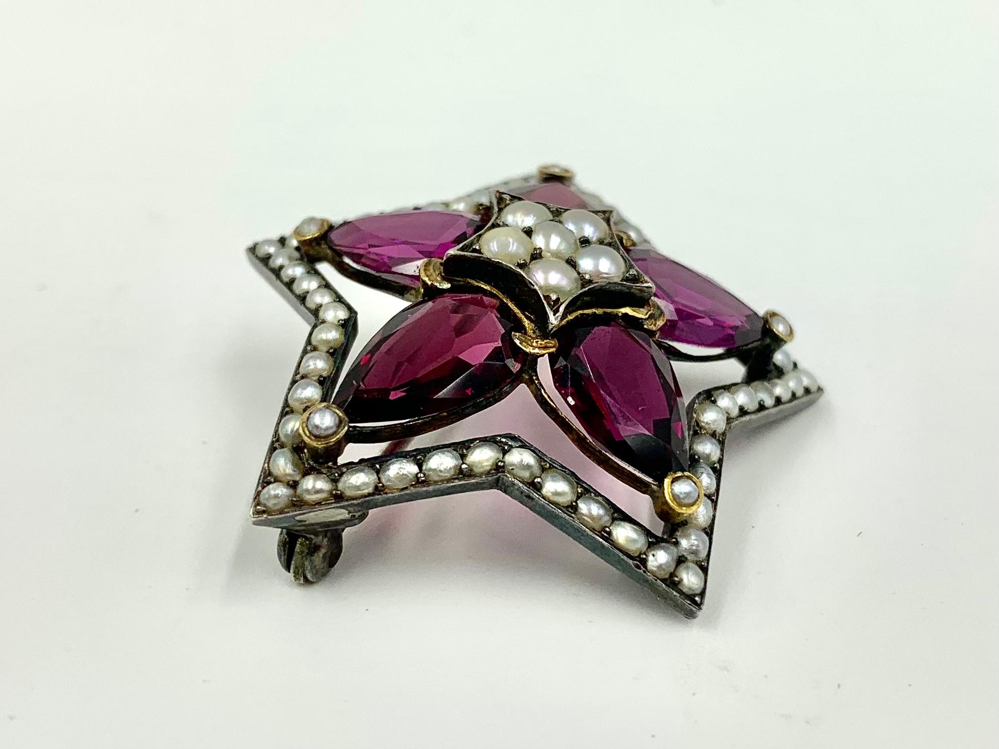 11 TCW Large Pear Shaped Rhodolite Garnet 18K Gold, Silver, Pearl Star Brooch In Good Condition For Sale In New York, NY