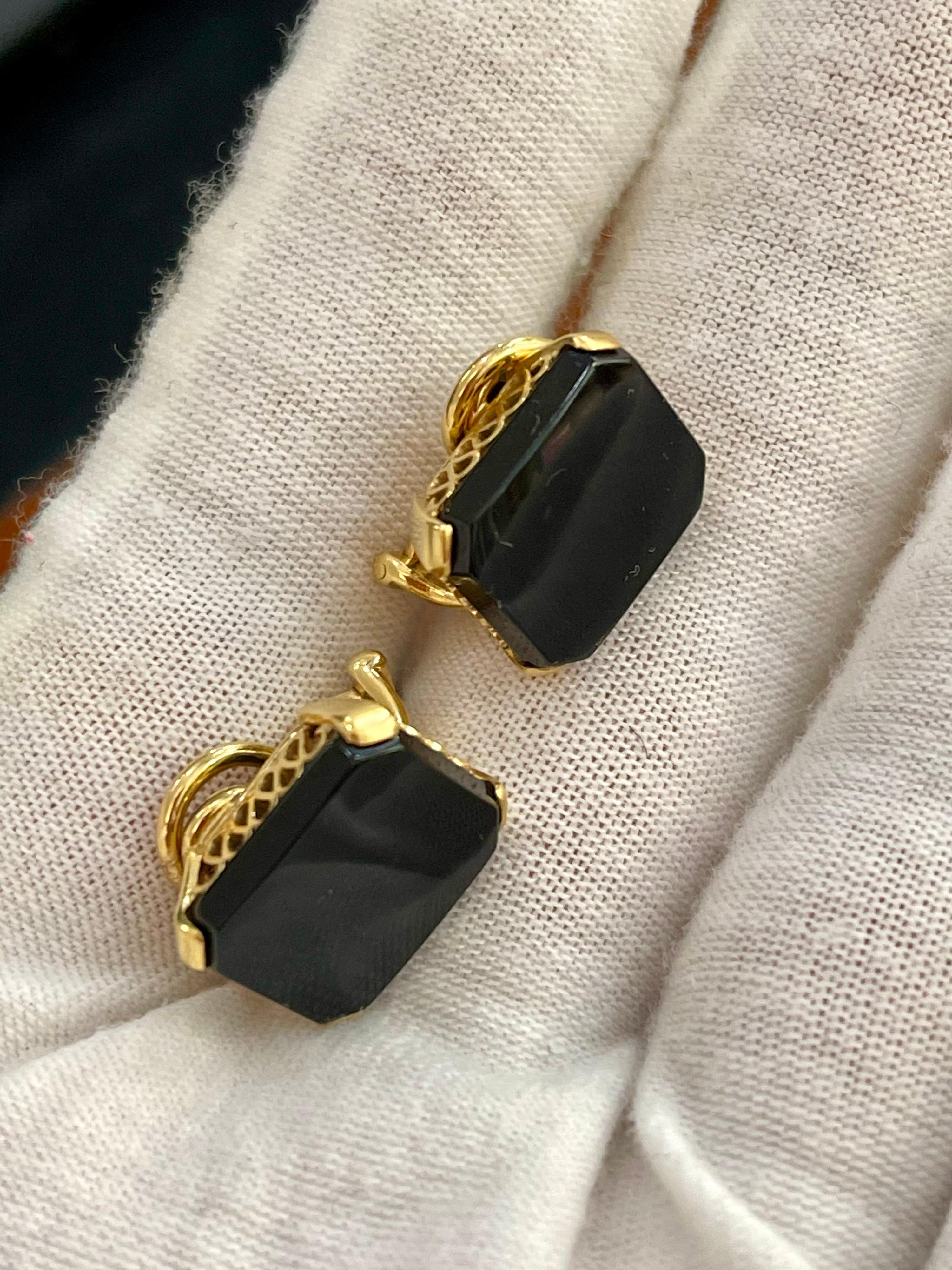 11 X 14 Emerald Cut Black Onyx  Clip Earring In 18 Karat  Yellow Gold , Earrings
Black Onyx perfect match pair earrings.
Stud earring with omega backs, clip earring
sits nicely on the earlobe
A post can be attached easily if you want them to be post