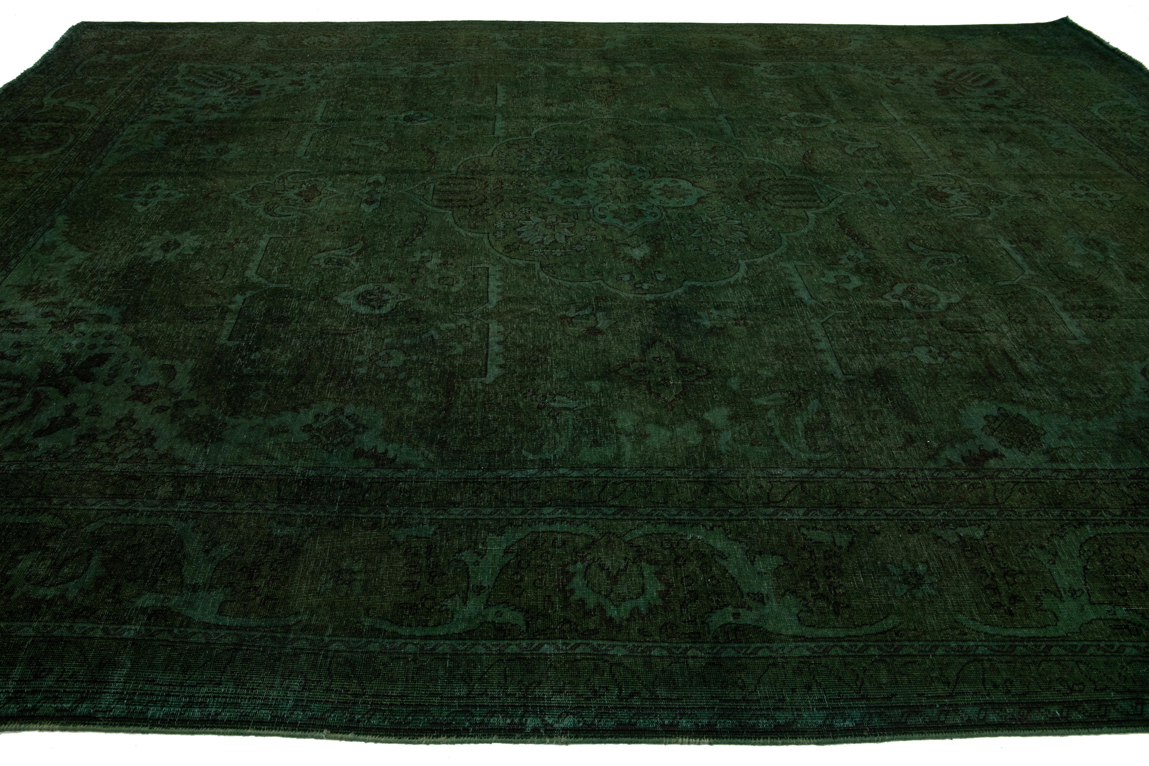 20th Century 11 x 16 Antique Overdyed Persian Wool Rug With Medallion Design In Green For Sale