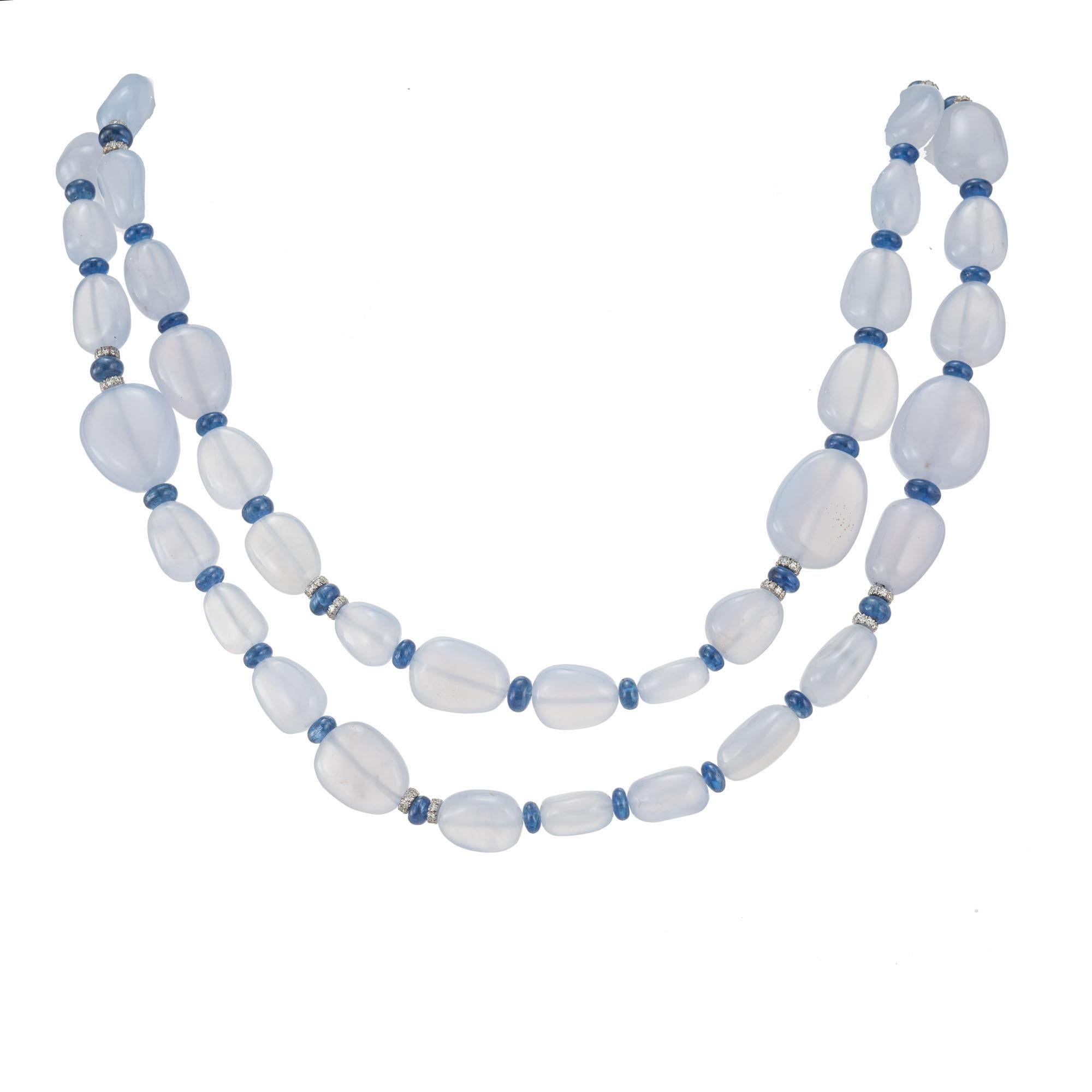 Translucent natural blue chalcedony bead necklace with genuine blue sapphire rondels spacers and 18k white gold diamond rondel with an 18k white gold diamond catch. 30 inches long. 

50 blue chalcedony pale blue beads
51 blue sapphire rondel