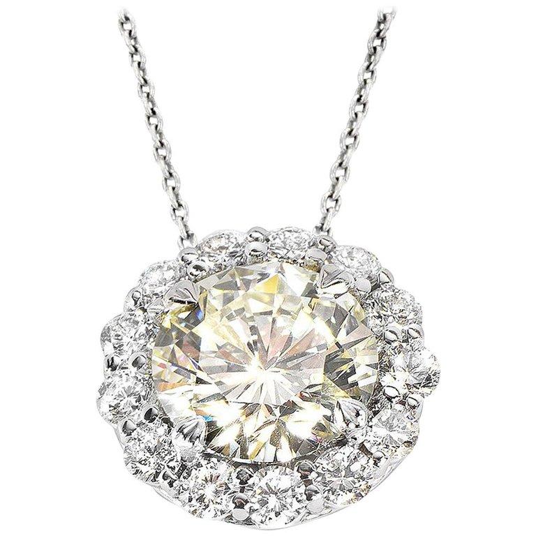 Round Cut 1.10 Carat Diamond Pendant Surrounded by 1.0 Carat Diamonds 14 Karat Gold For Sale