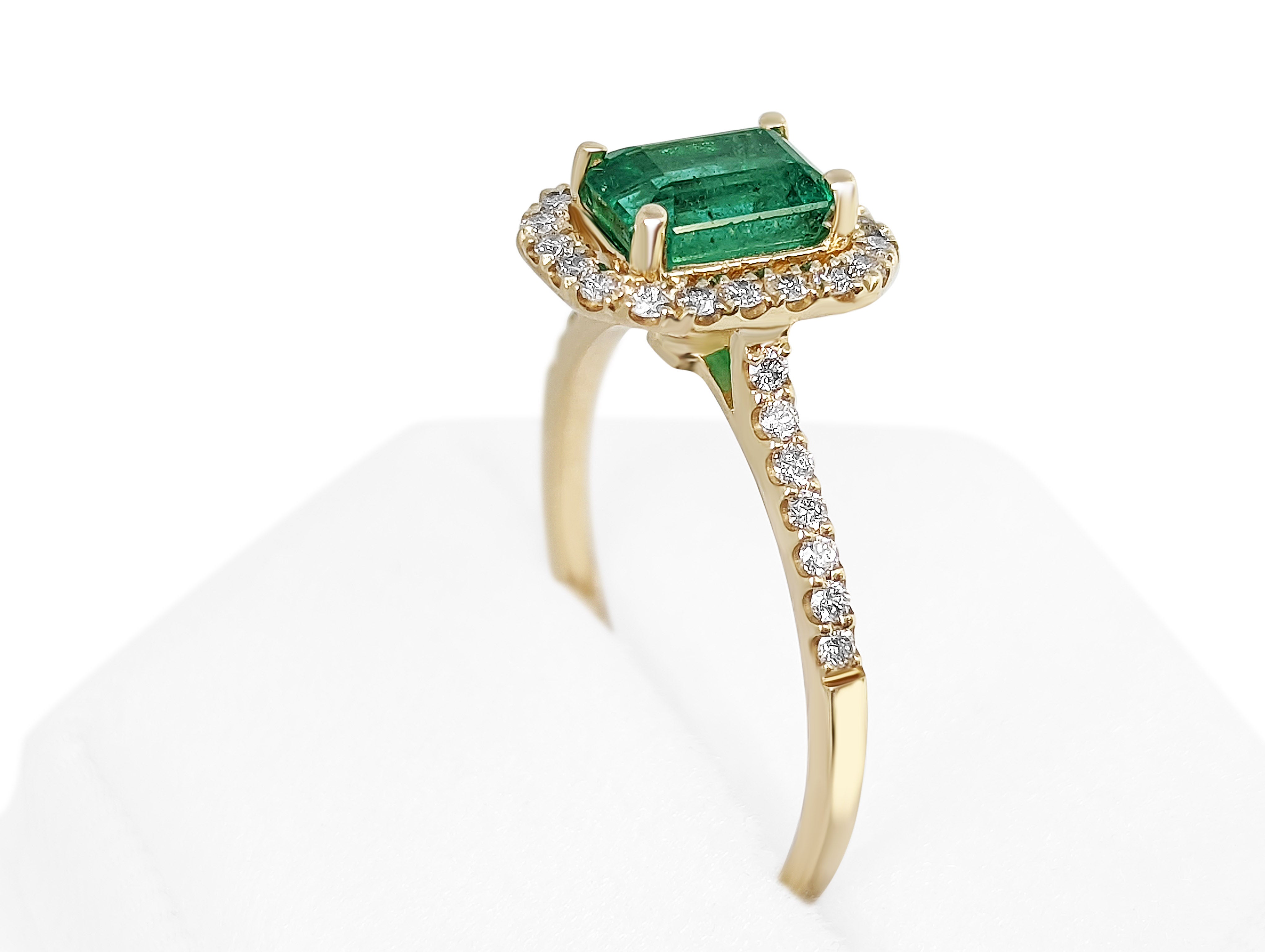 Ring can be sized free of charge prior to shipping out.

Center Stone:
___________
Natural Emerald
Cut: Cut Cornered Rectangle Step Cut
Carat: 1.10 ct
Color: Green

Side Stones:
___________
Natural Diamonds
Cut: Round 
Carat: 0.30 tccw / 34