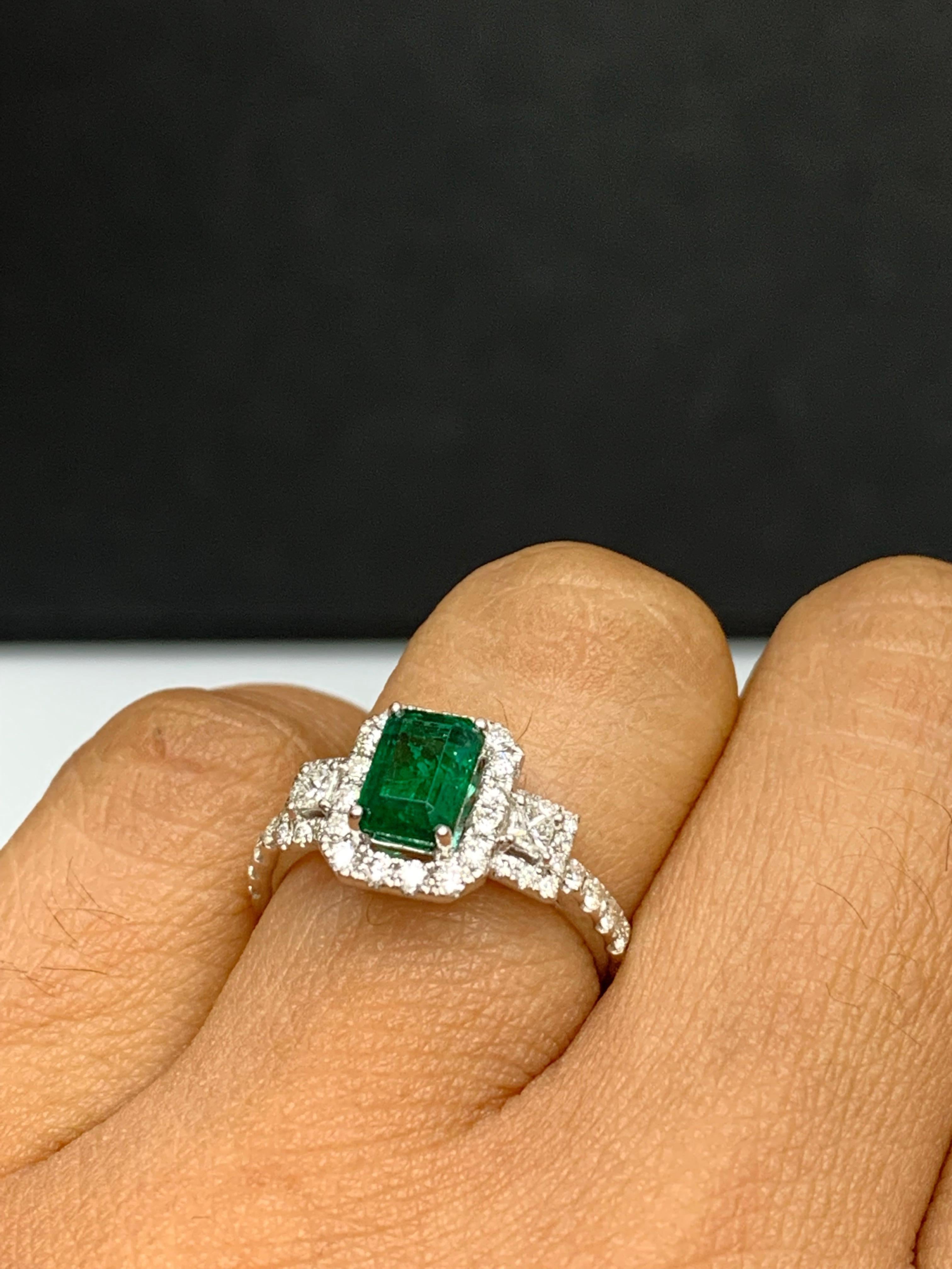 Modern 1.10 Carat Emerald Cut Emerald and Diamond Ring in 18k White Gold For Sale