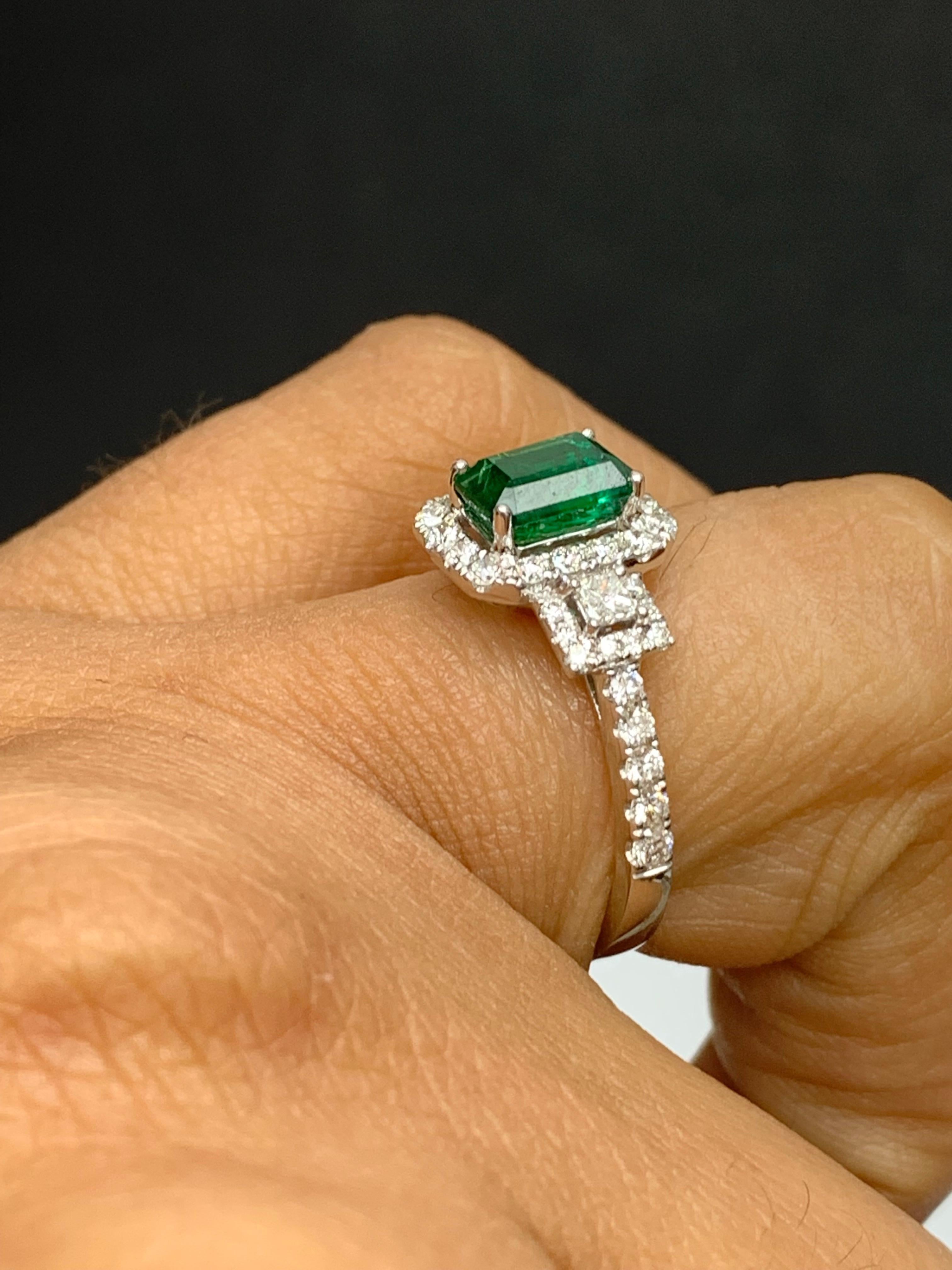 1.10 Carat Emerald Cut Emerald and Diamond Ring in 18k White Gold In New Condition For Sale In NEW YORK, NY
