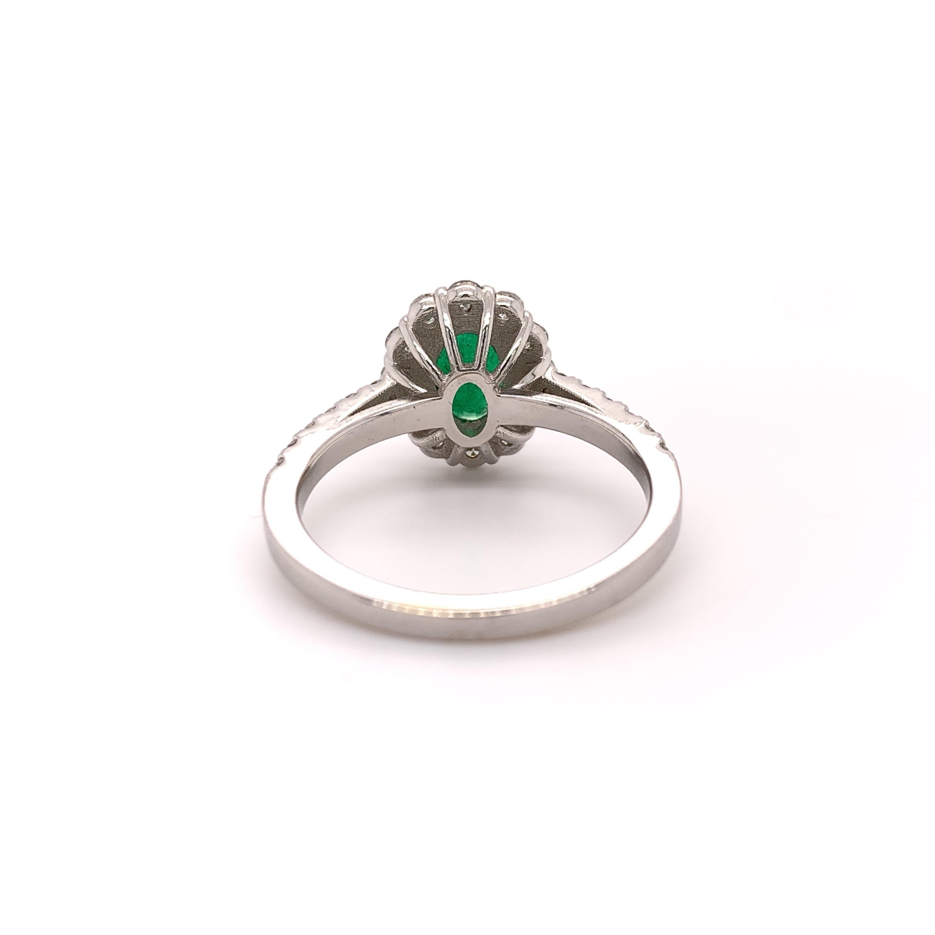 Contemporary 1.10 Carat Emerald Diamond Halo Ring