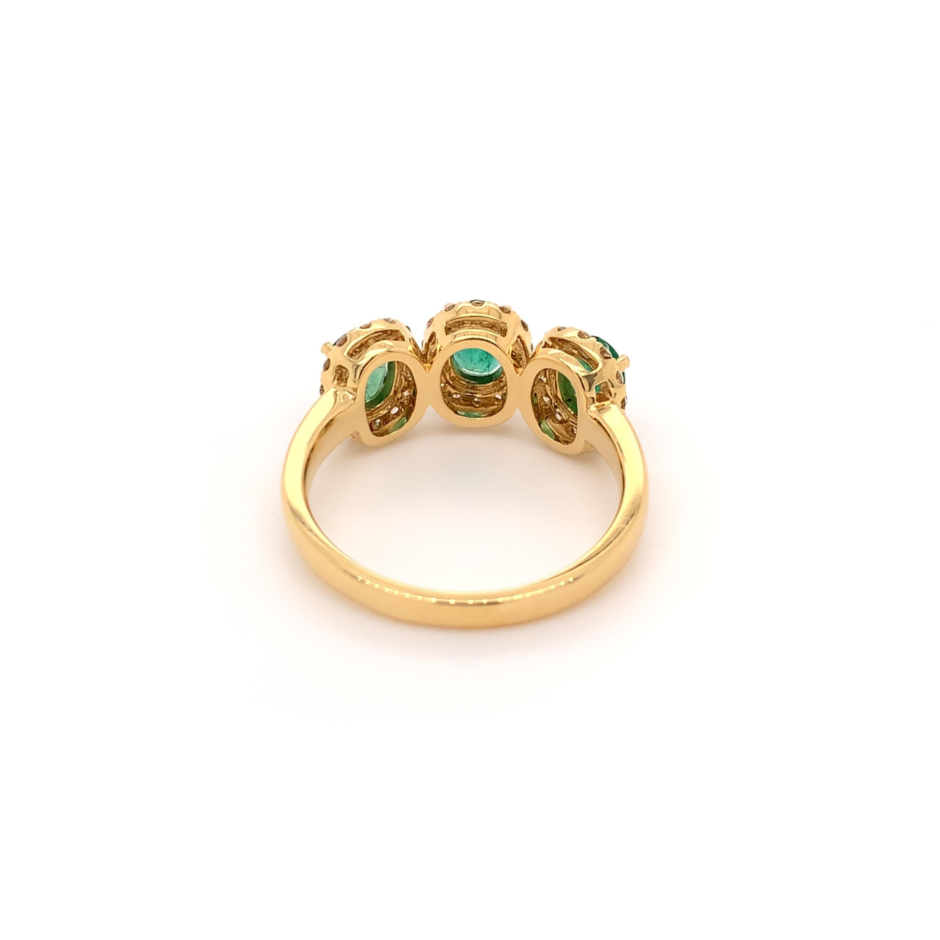 emerald trinity ring
