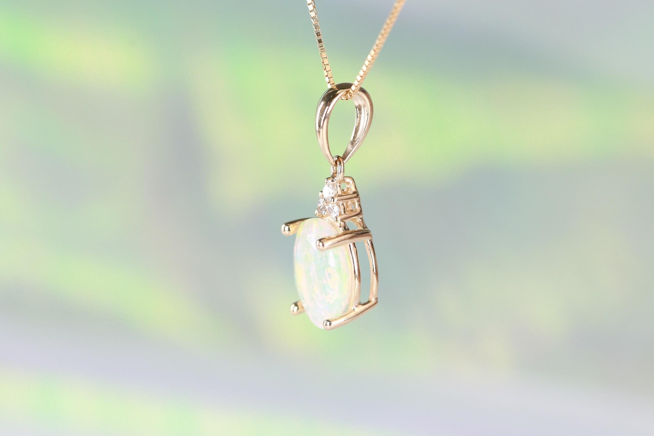 Crafted of an oval cut Gin & Grace Natural Opal and brilliant diamond pendant , this impressive pendent is the ideal way to enhance yourself and show off your sense of fashion. The delightful pendant is adorned with an accent of brilliant diamonds.