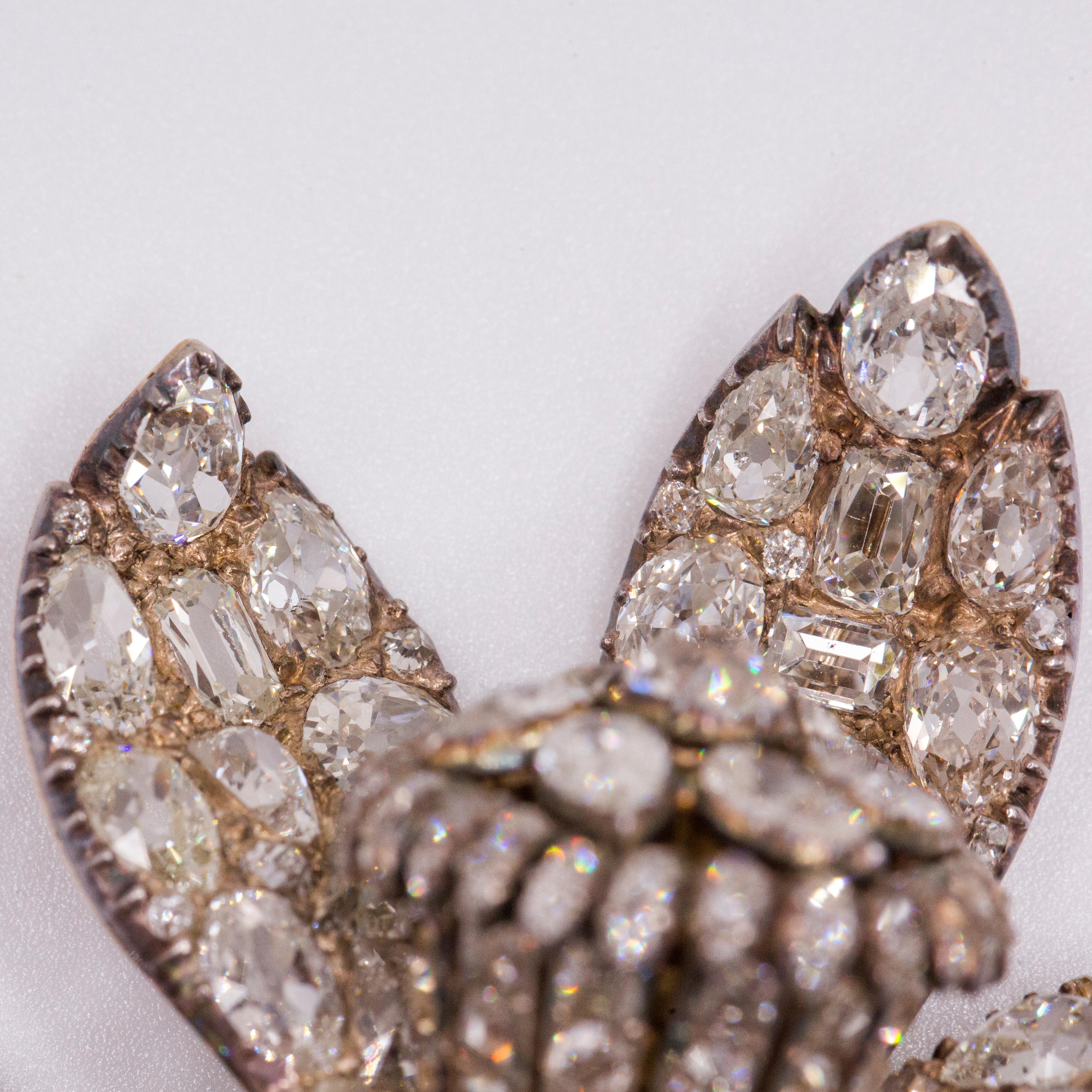 Inundating petals of precious karat gold and silver are encrusted with 324 fine, hand-cut diamonds weighing 110 carats. An exceptional jewel and object d'art of, the brooch became a piece of Americana when acquired by Anna Dilman Dodge in about