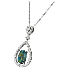 1.10 Carat Natural Australian Black Opal and Diamond Pendant Made in Platinum