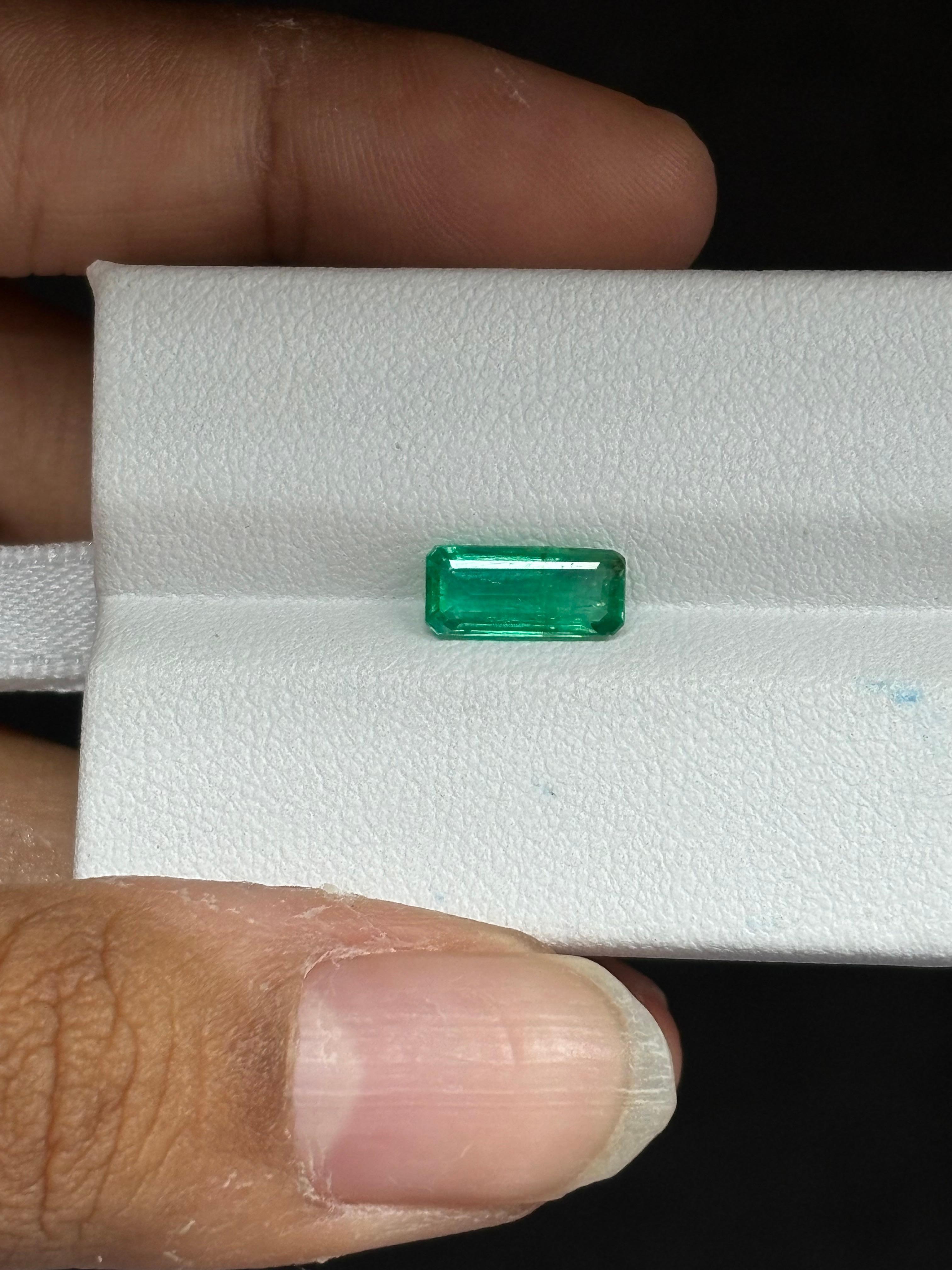 A stunning 1.10 Carat Emerald stone that is a gorgeous shade of vivid green and is a panjshir Emerald. It is completely natural and of good quality. The emerald piece is cut into perfection in an elongated emerald-cut shape.

The green emerald has