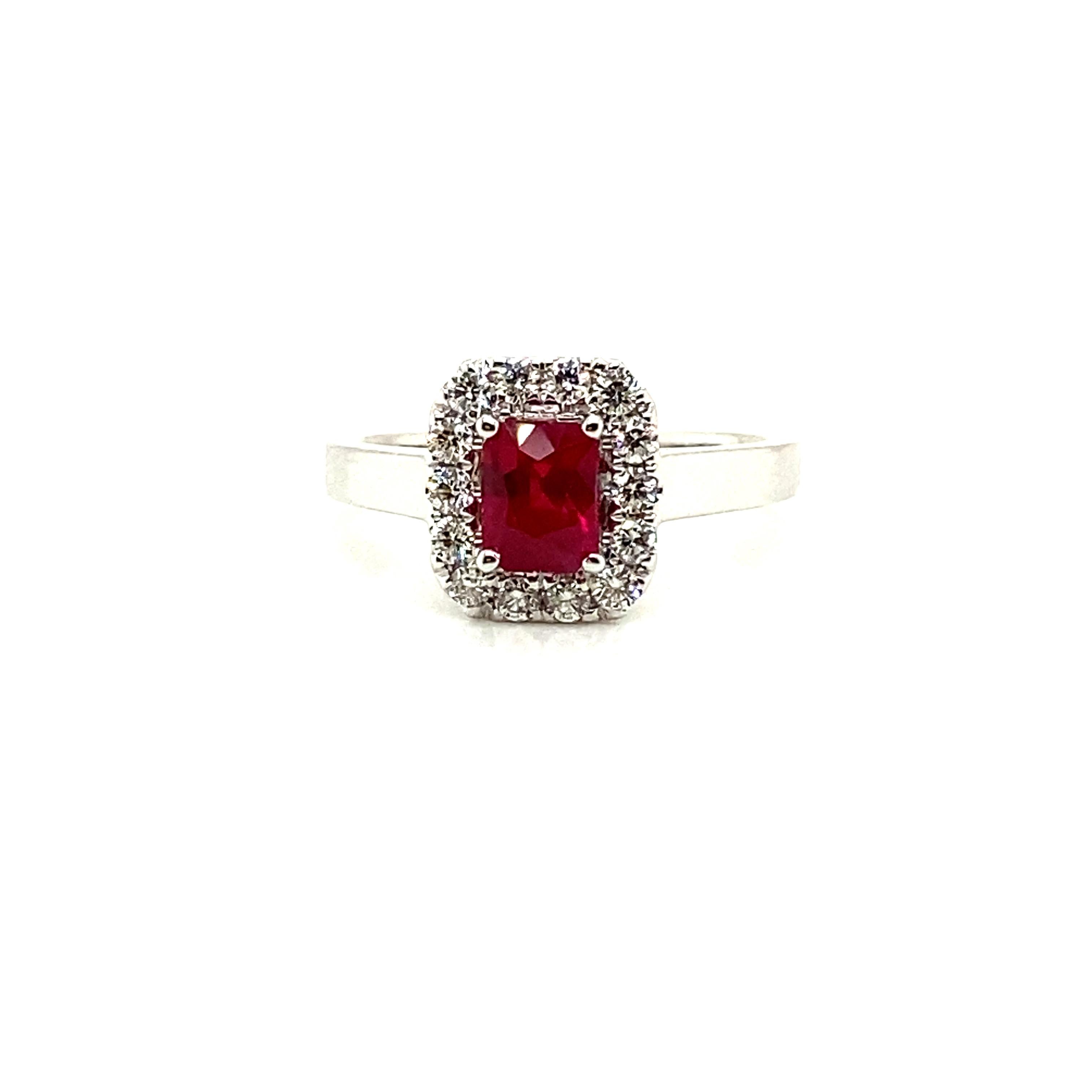 1.10 Carat Octagon-Cut Pigeon's Blood Red Ruby and White Diamond Ring:

A beautiful ring, it features an octagon-cut vivid red ruby weighing 1.10 carat surrounded by a halo of white round-brilliant cut diamonds weighing 0.34 carat. The ruby is of