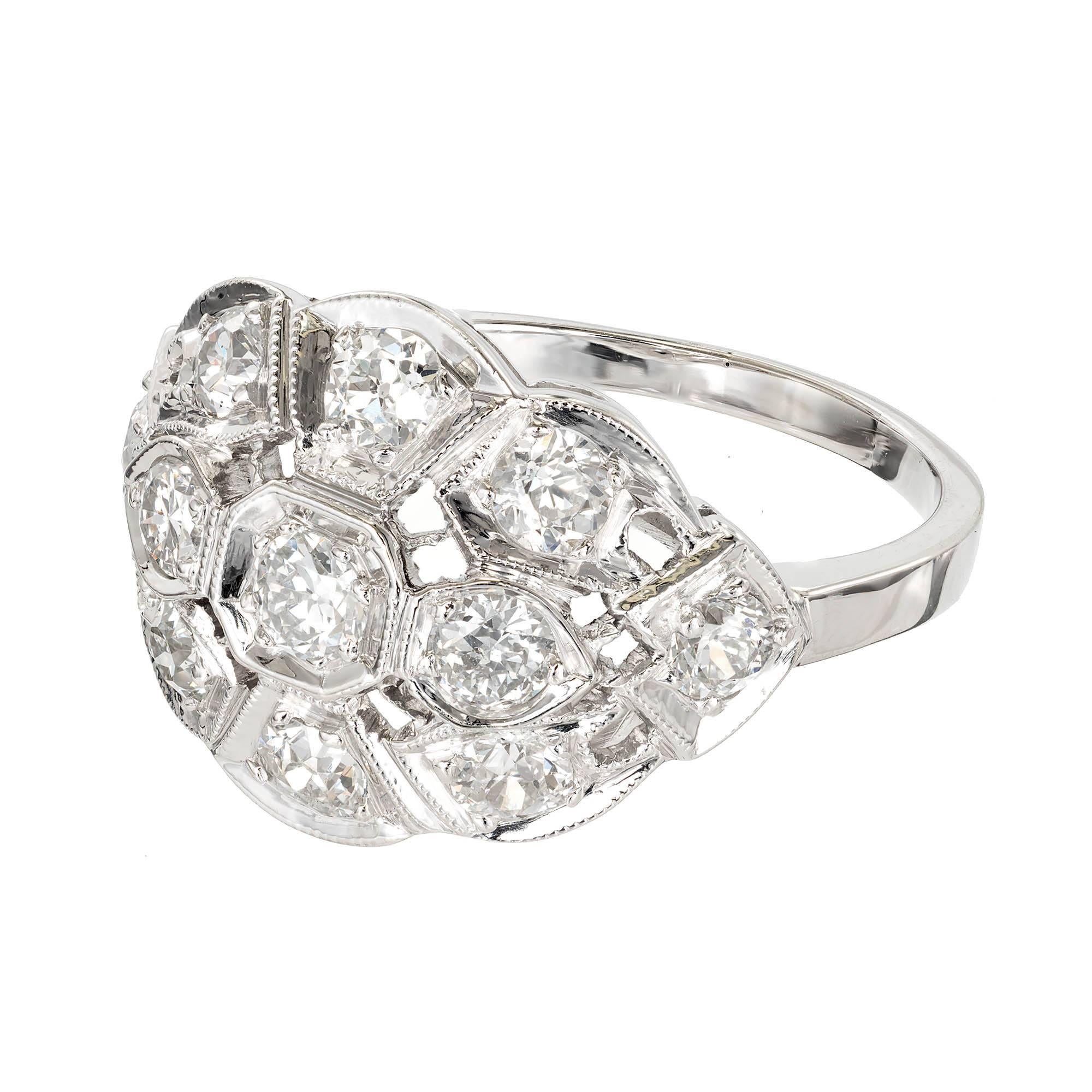 Vintage Art Deco 1930s old European and transitional cut Diamond pierced dome cocktail ring, in 14k white gold.

11 old European cut Diamonds, approx. total weight 1.10cts, G – H, VS – SI
Size 5.75 and sizable
14k white gold
Tested and stamped:
