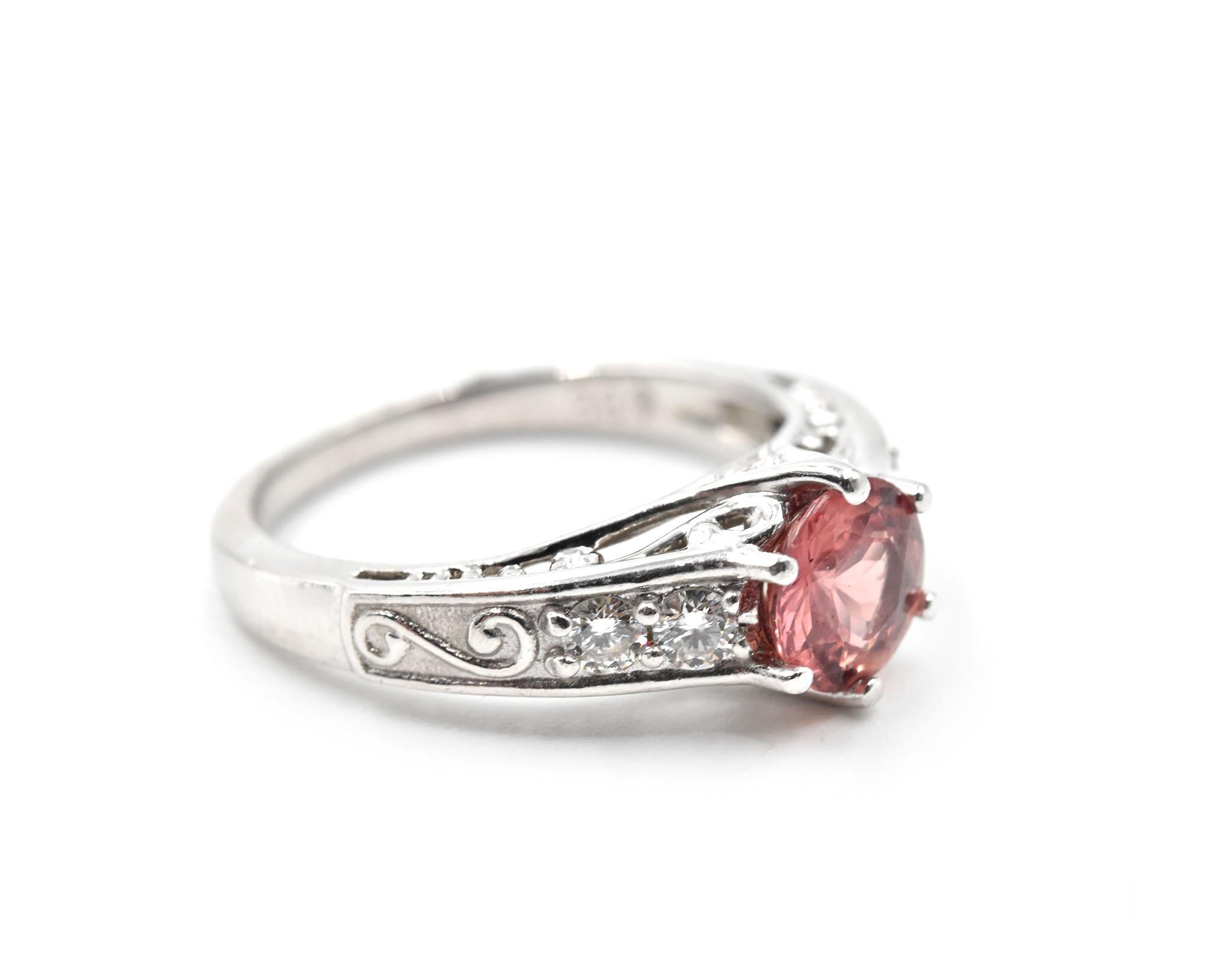 Designer: custom design
Material: platinum
Pink Sapphire: round brilliant 1.10 carat 
Diamonds: four round brilliant cut = 0.28 carat weight
Ring Size: 6 3/4 (please allow two additional shipping days for sizing requests)
Weight: 6.70 grams
