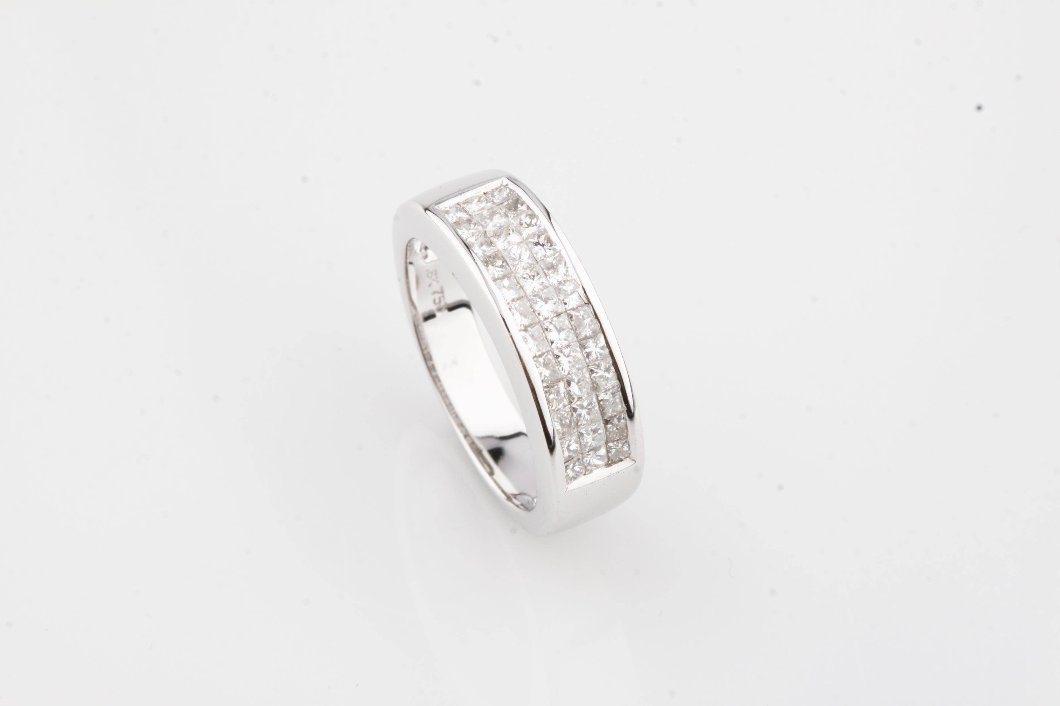 Gorgeous Plaque Ring
Features 36 Invisible Set Princess Cut Stones in a Plaque Setting
Total Diamond Weight = Appx 1.10 ct
Total Mass = 6.9 grams